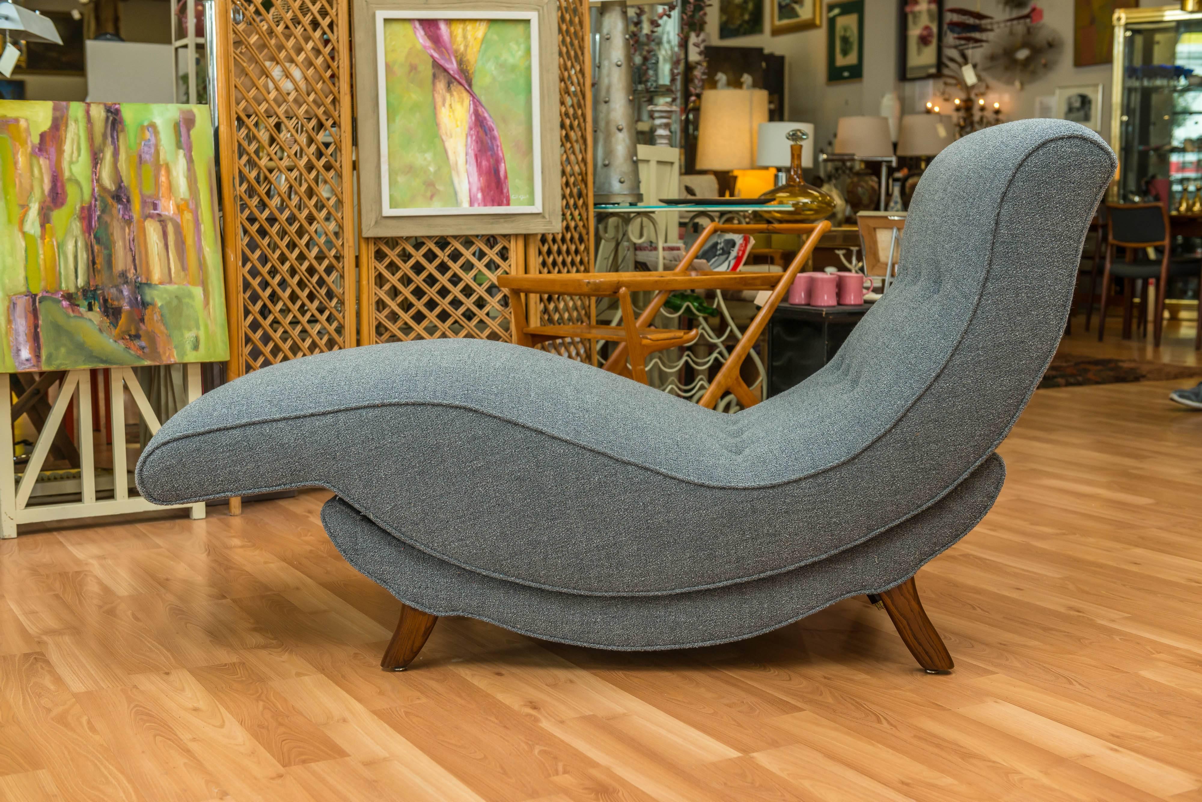 Classic fifties, Contour lounge chair, been reupholstered in a grey wool. It vibrates and reclines back, then goes forward. A very comfortable lounger, perfect for those lazy Saturday afternoons.