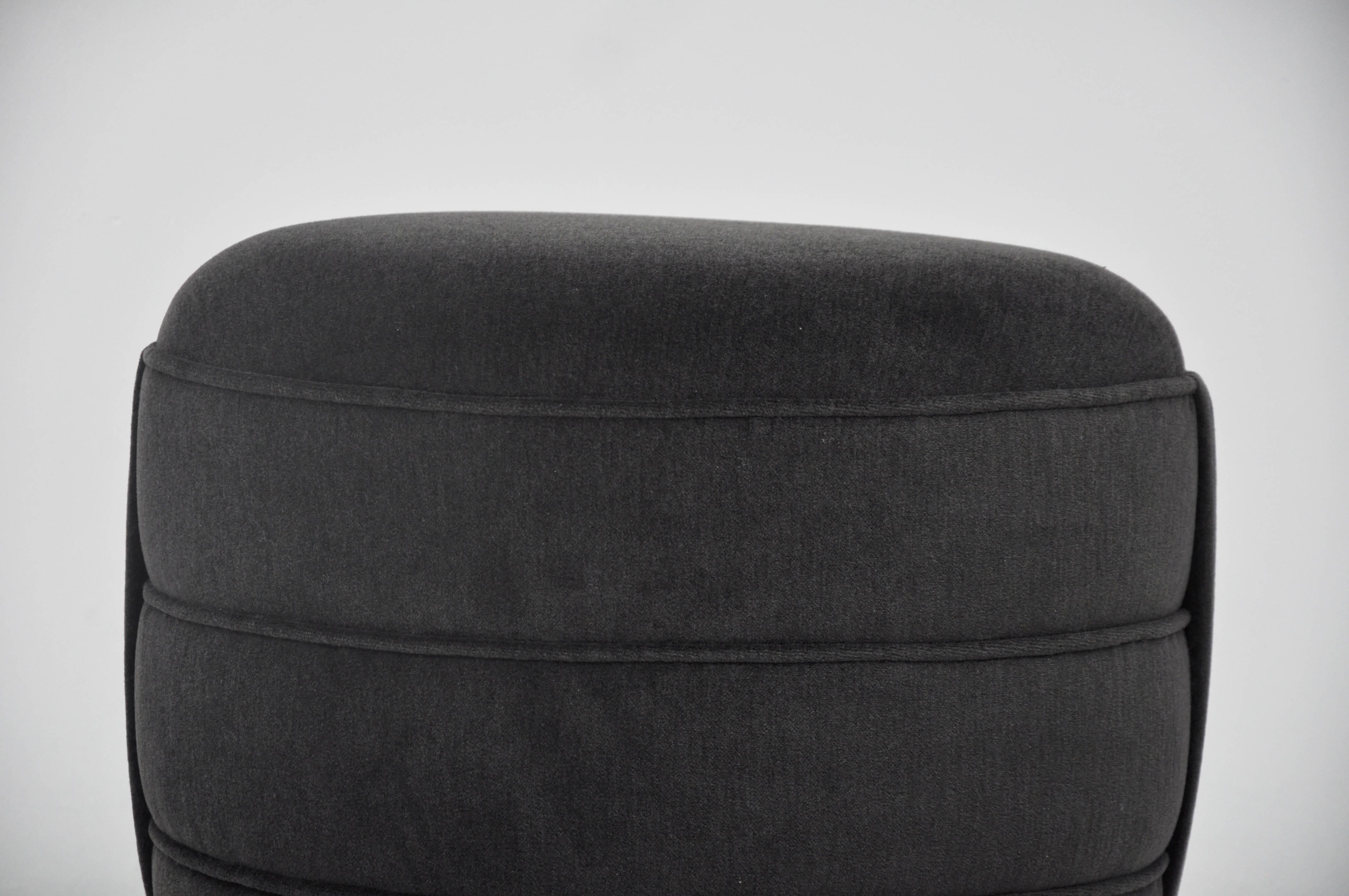 Early design pouf ottoman by Edward Wormey for Dunbar. Mahogany base with new grey mohair upholstery.