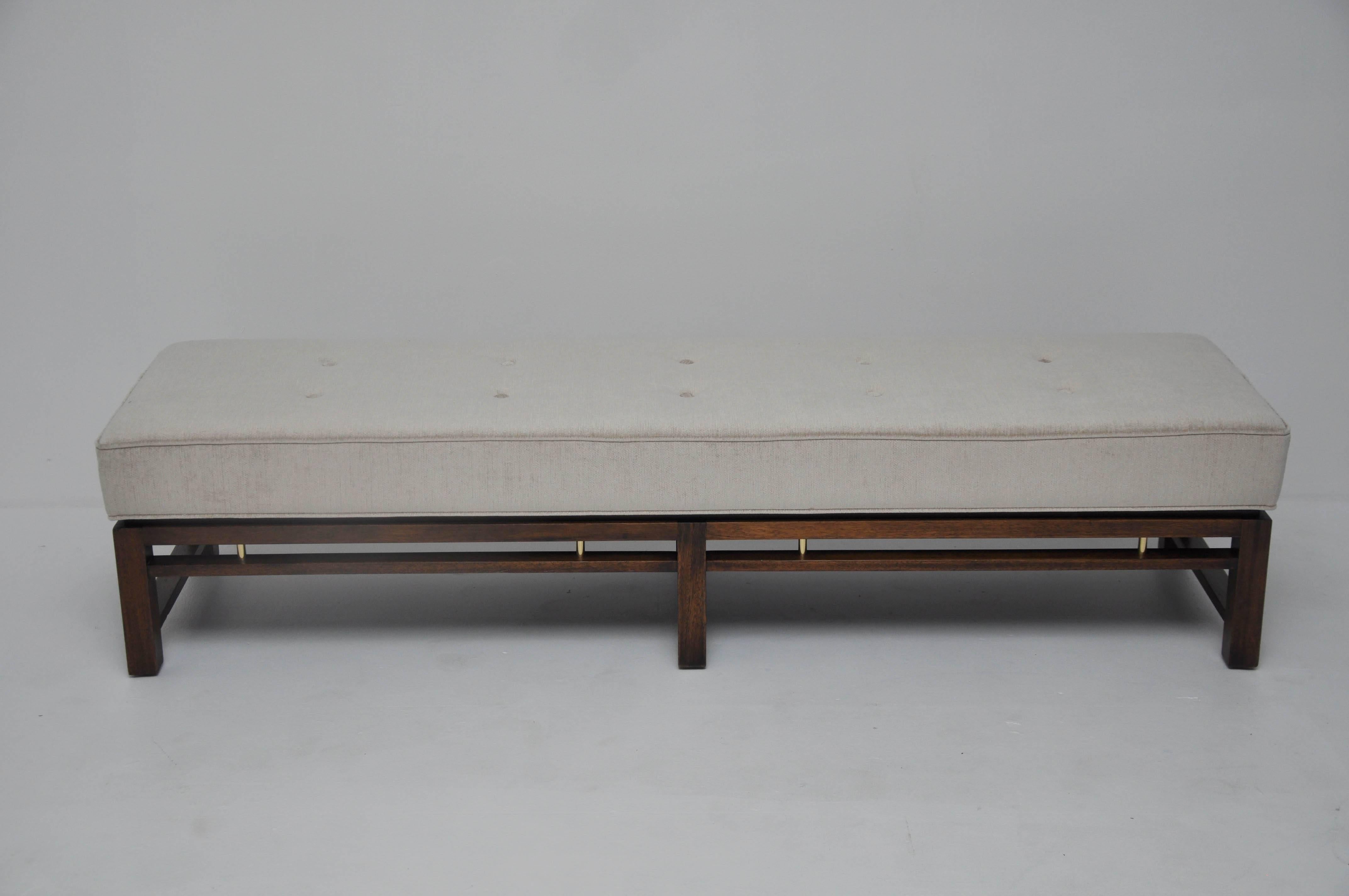 Bench by Edward Wormley for Dunbar. Mahogany frame with brass details. Newly upholstered.