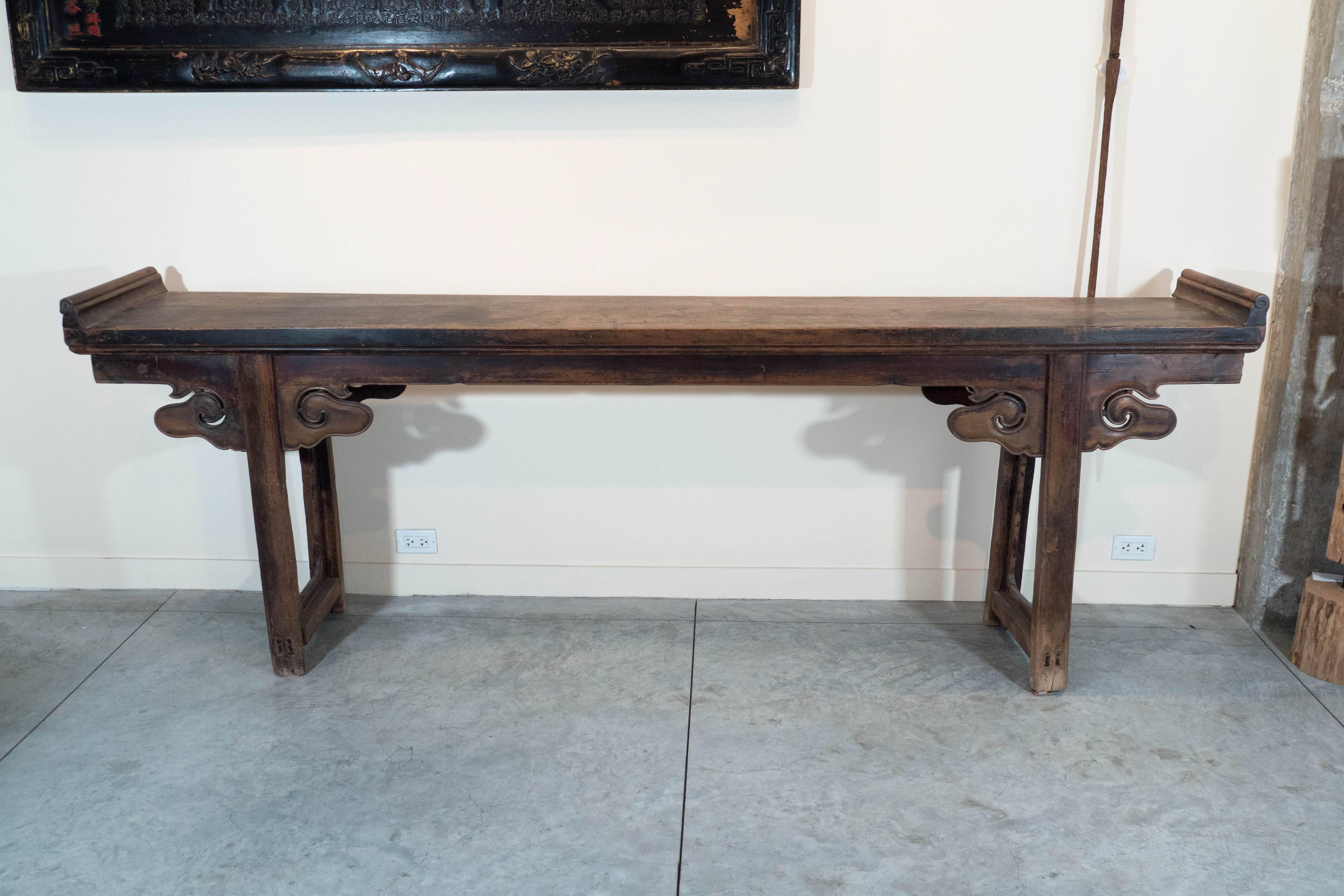 A very large, striking and classically designed 18th century Chinese altar table. This is a very unusual piece that is over 200 years old. It is constructed out of rarely seen and truly gorgeous walnut wood, exhibiting a beautiful patina. At