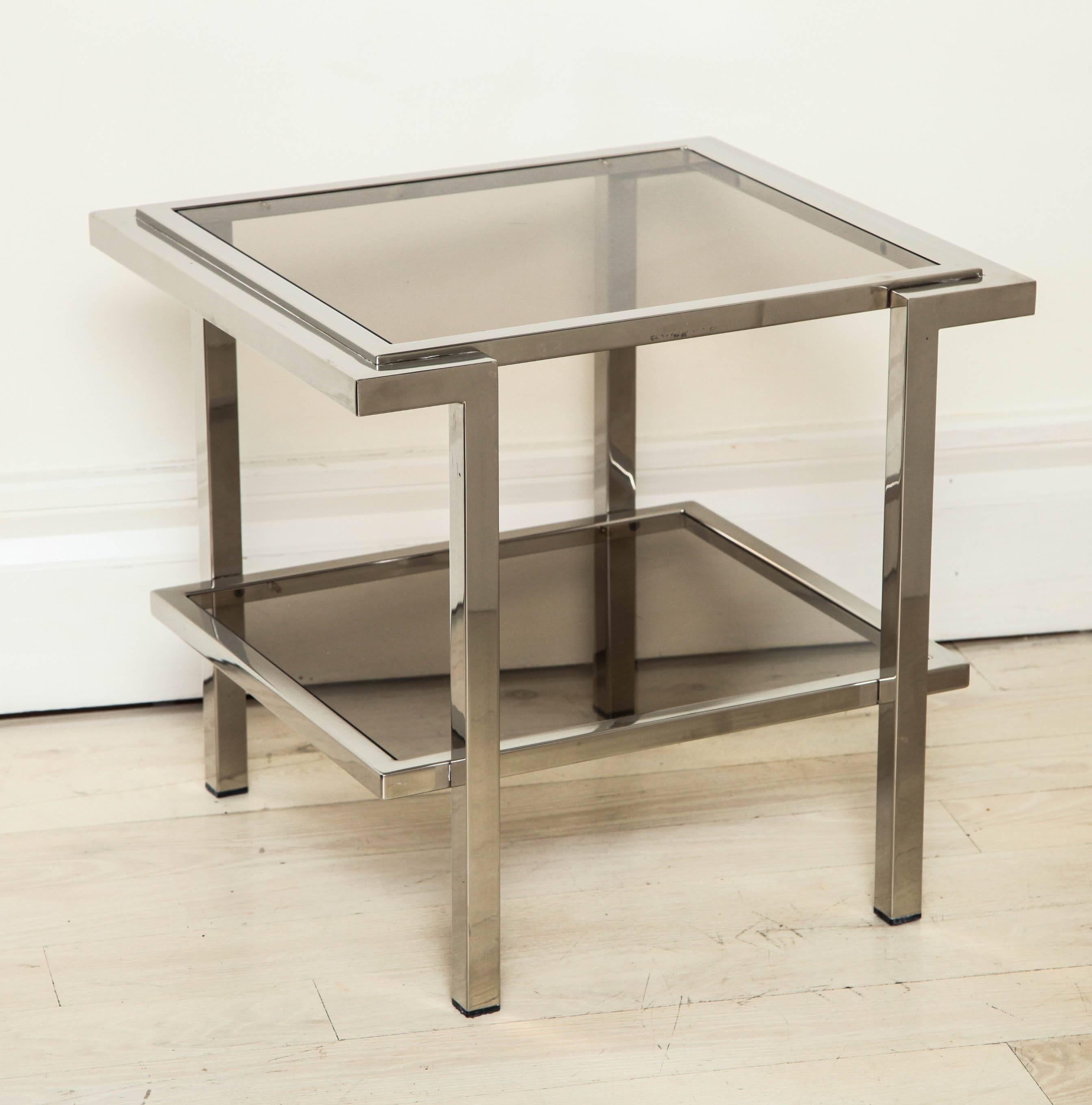 Pair of modern chrome and light gray glass two-tiered coffee tables.