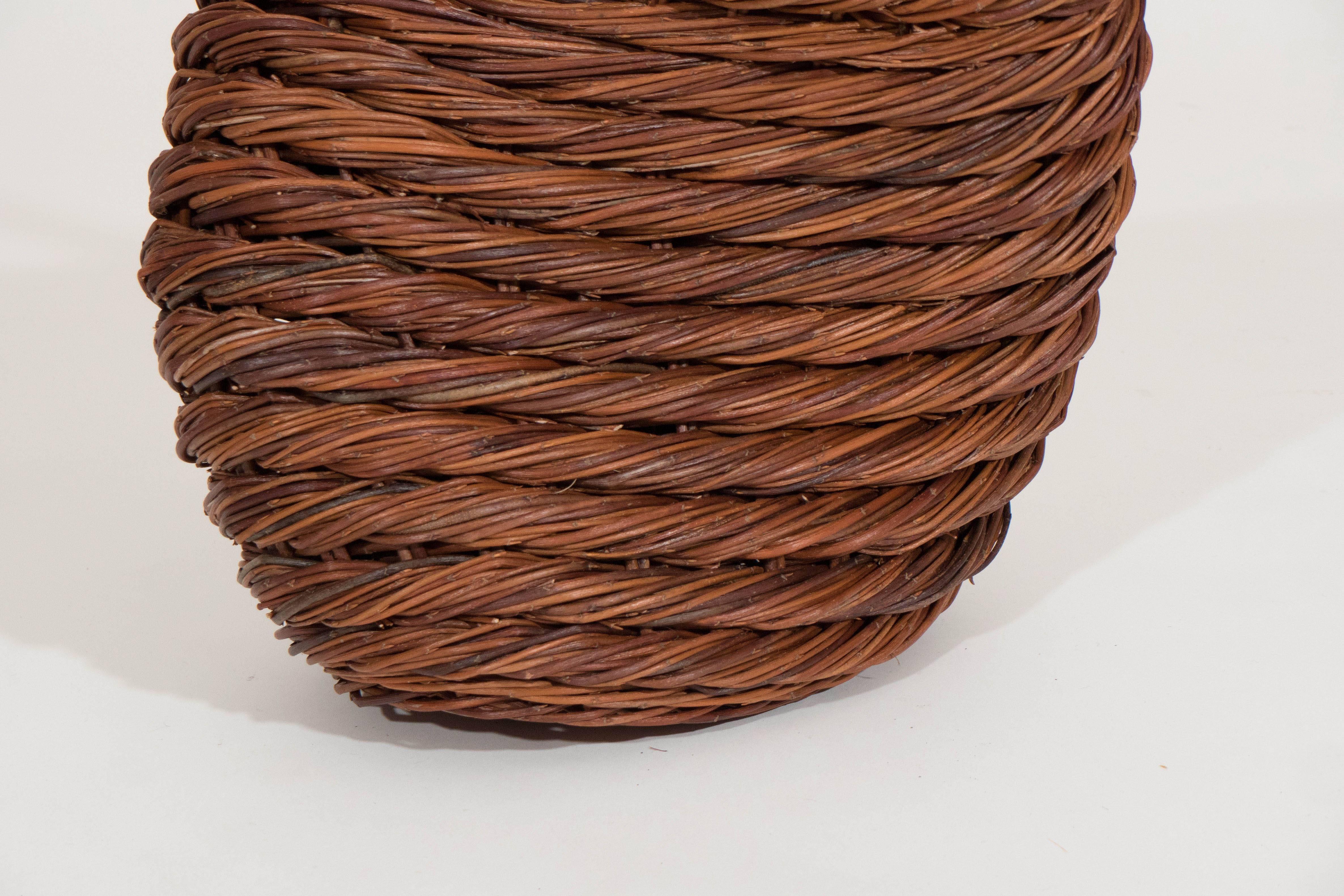 Trained as a basket maker in Erkner, Germany during the 1980s, Klaus Titze combines technology and artisanal tradition with his basket forms. Organically shaped wicker forms are made using a special twisting technique.