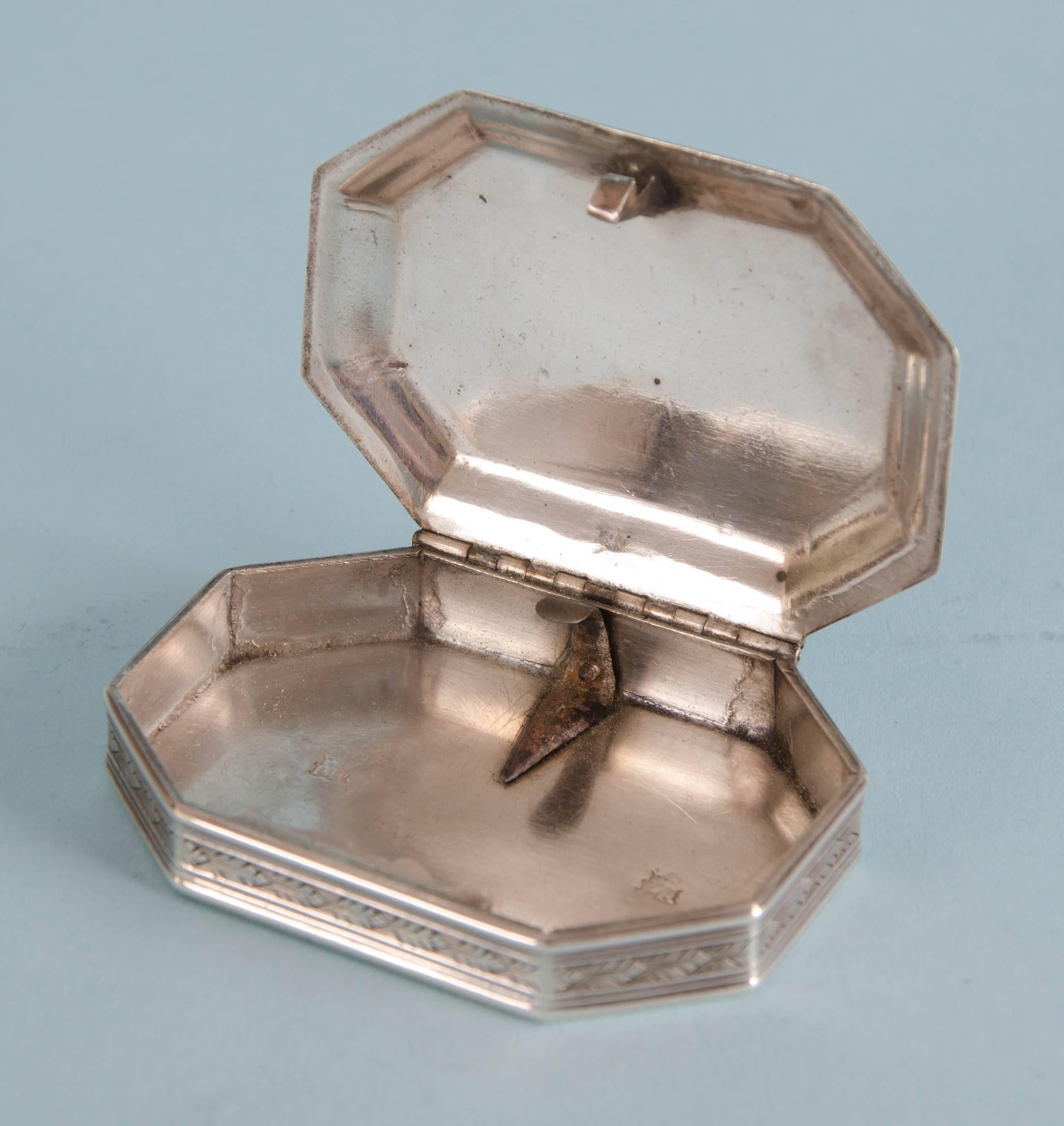 Rare and beautifully engraved William and Mary 17th Century silver cut-corner rectangular box.  Stamped twice with the maker’s mark only on the inside of the base – “PR” crowned -  an unattributed London silversmith.  It was not unusual for such