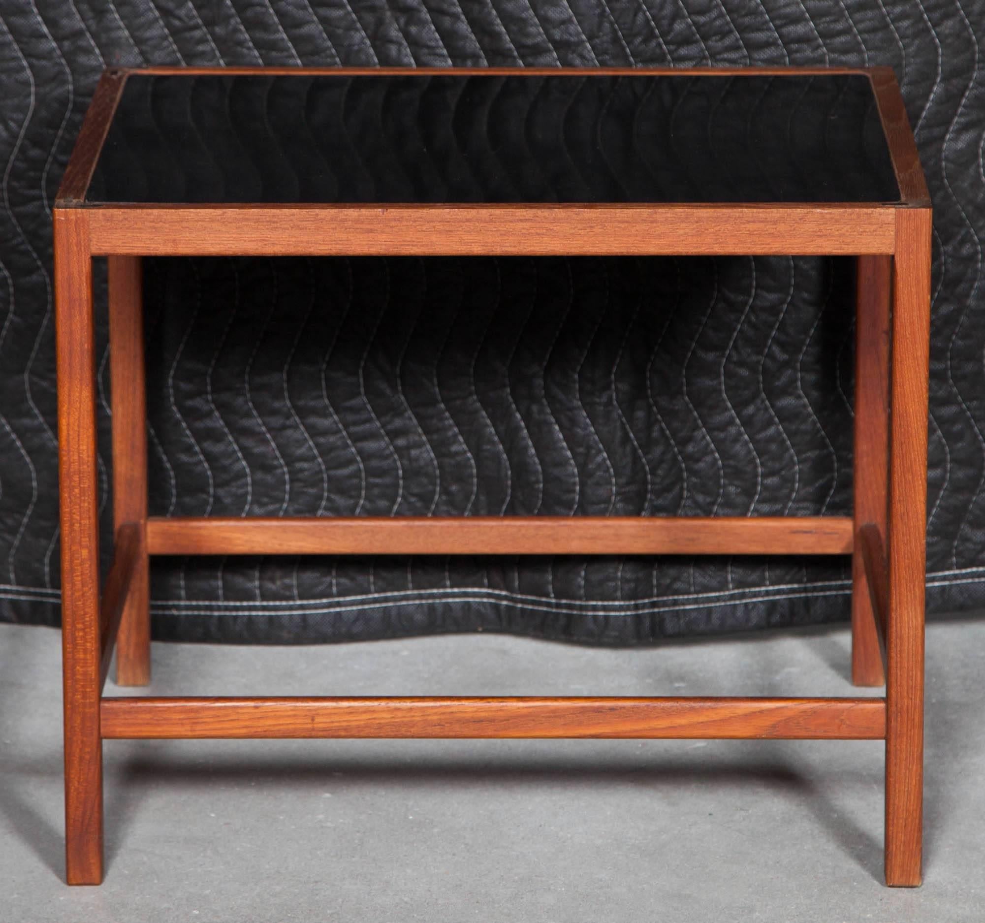 Vintage 1950s Accent Table with Black Laminate Top

This end table is in like-new condition and shows it's beautiful joinery. Simple classic design with warm teak frame. Ready for pick up, delivery, or shipping.