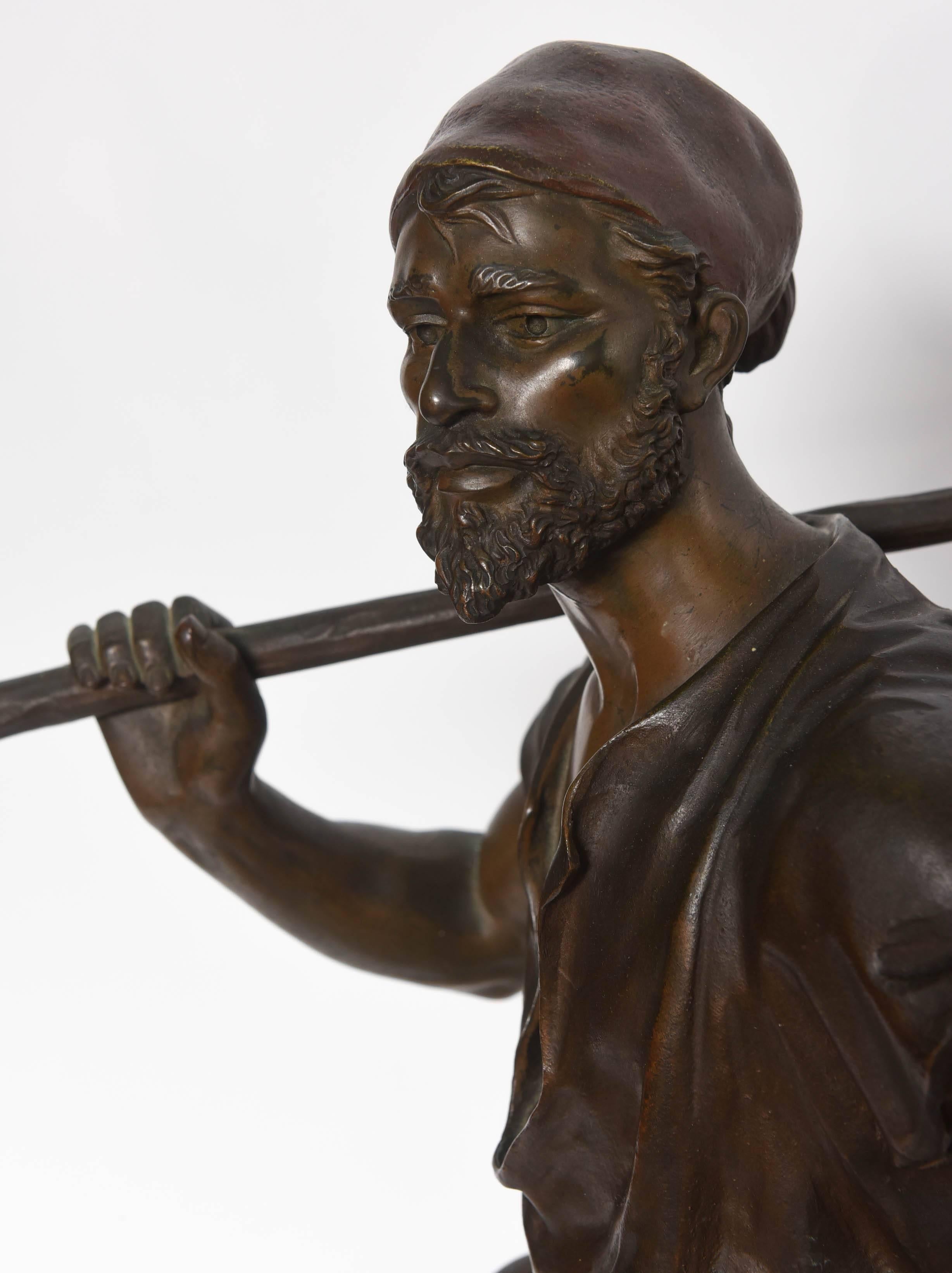 Superbly fashioned figure of a water carrier by the famed French sculptor.
Cast in the Gautier foundry.