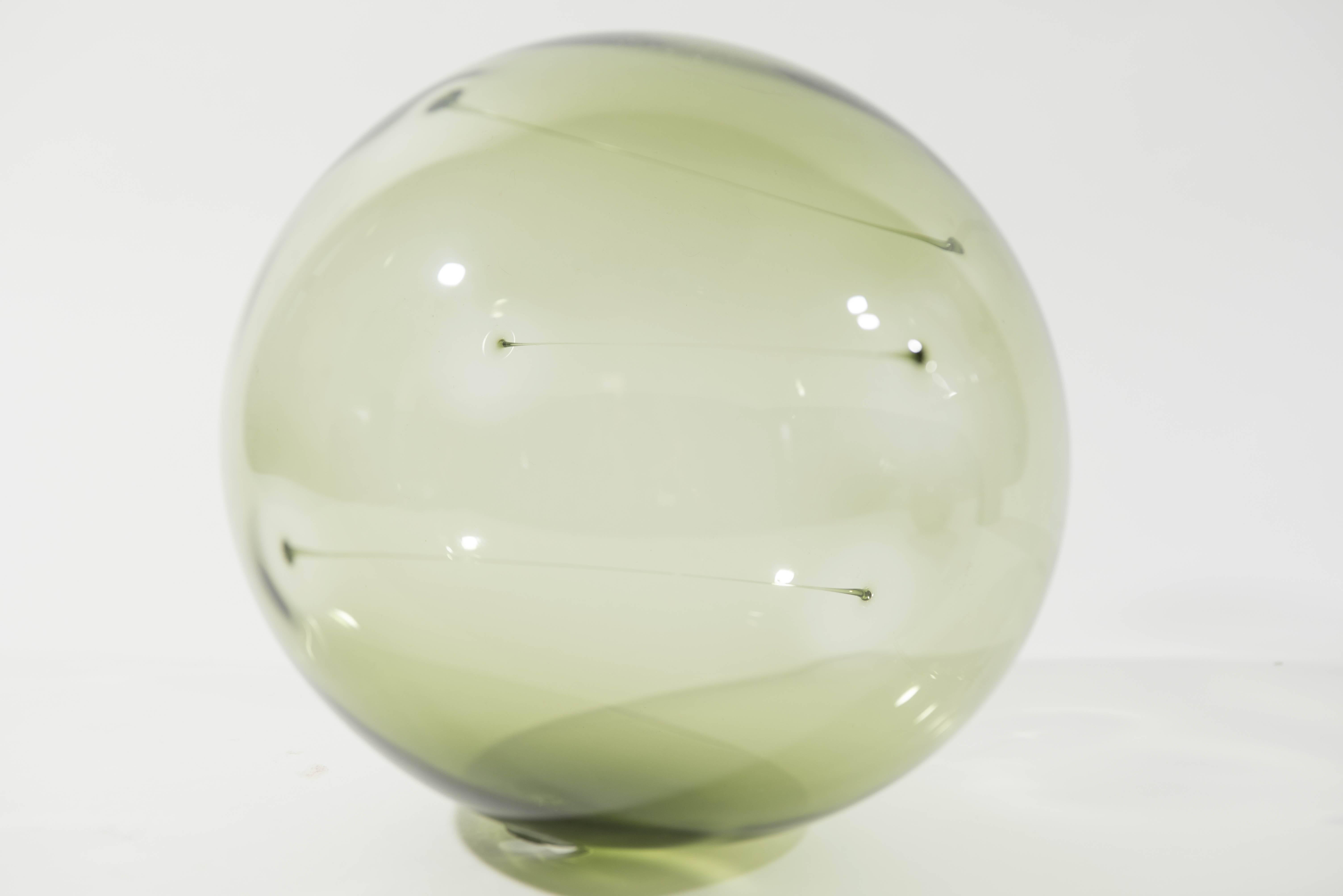 Designed by Timo Sarpaneva for Ittala.
Bird bottles 11.5'' and 6.5'' high.
Sun ball: 8'' diameter.