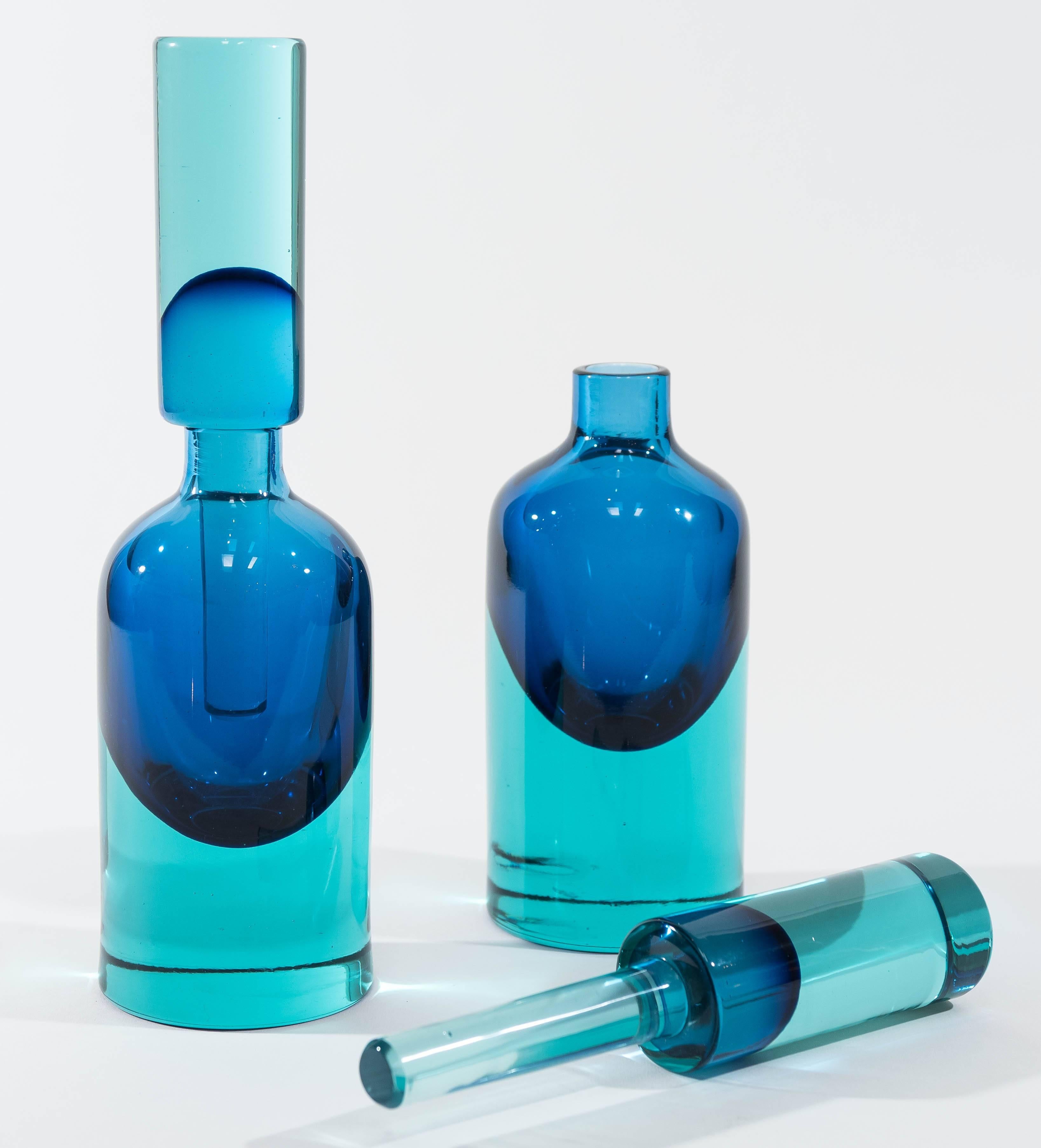 An incredible  weighty Sommerso glass Murano perfume bottle in blue and aqua green-marine hues. This stunning bottle is attributed to designer
Flavio Poli.
