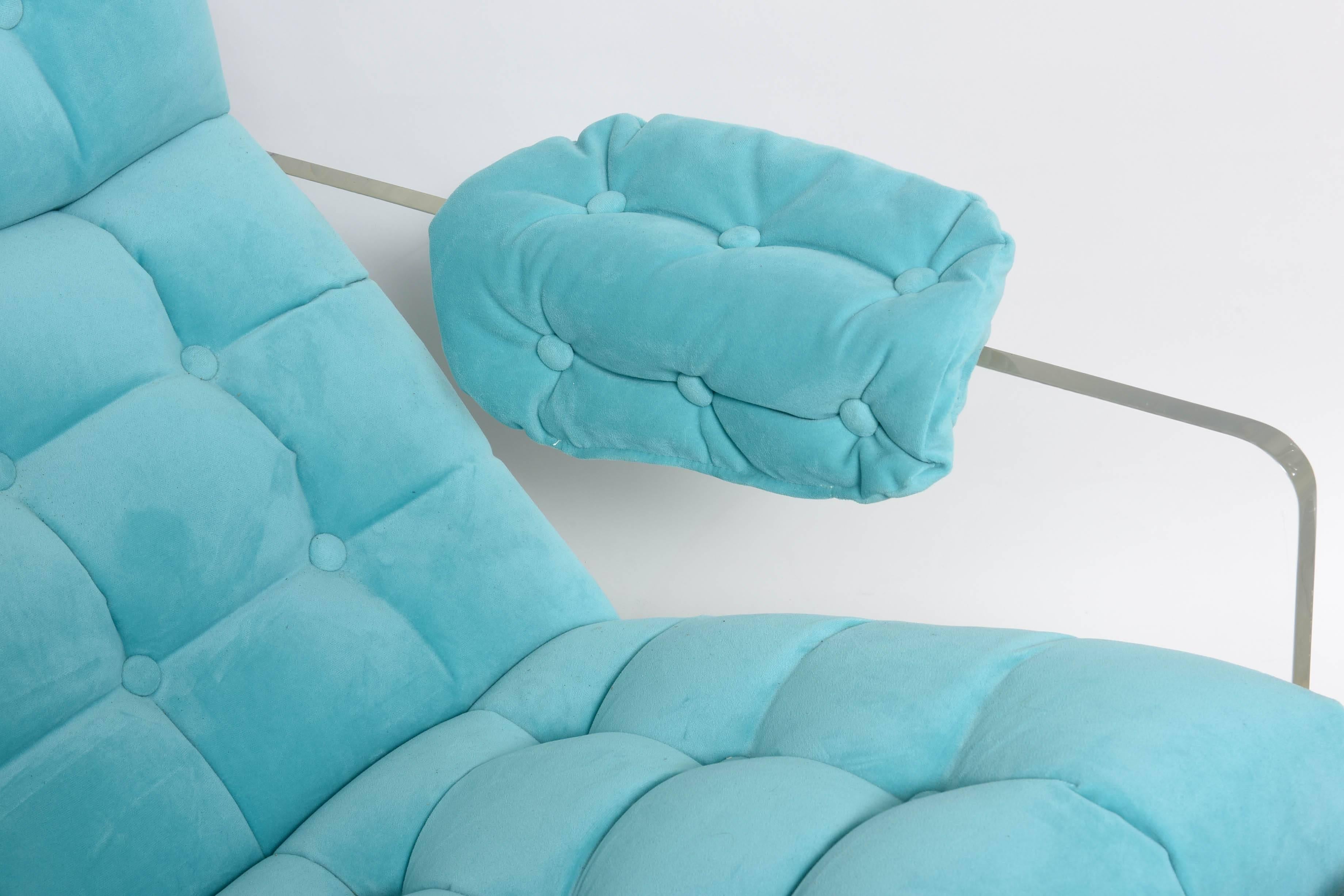 Amazing chair and ottoman dating back to the 1970s. Wood framed foam upholstered in aqua fabric, original Lucite panels have been polished. Dimensions on chair are W 29