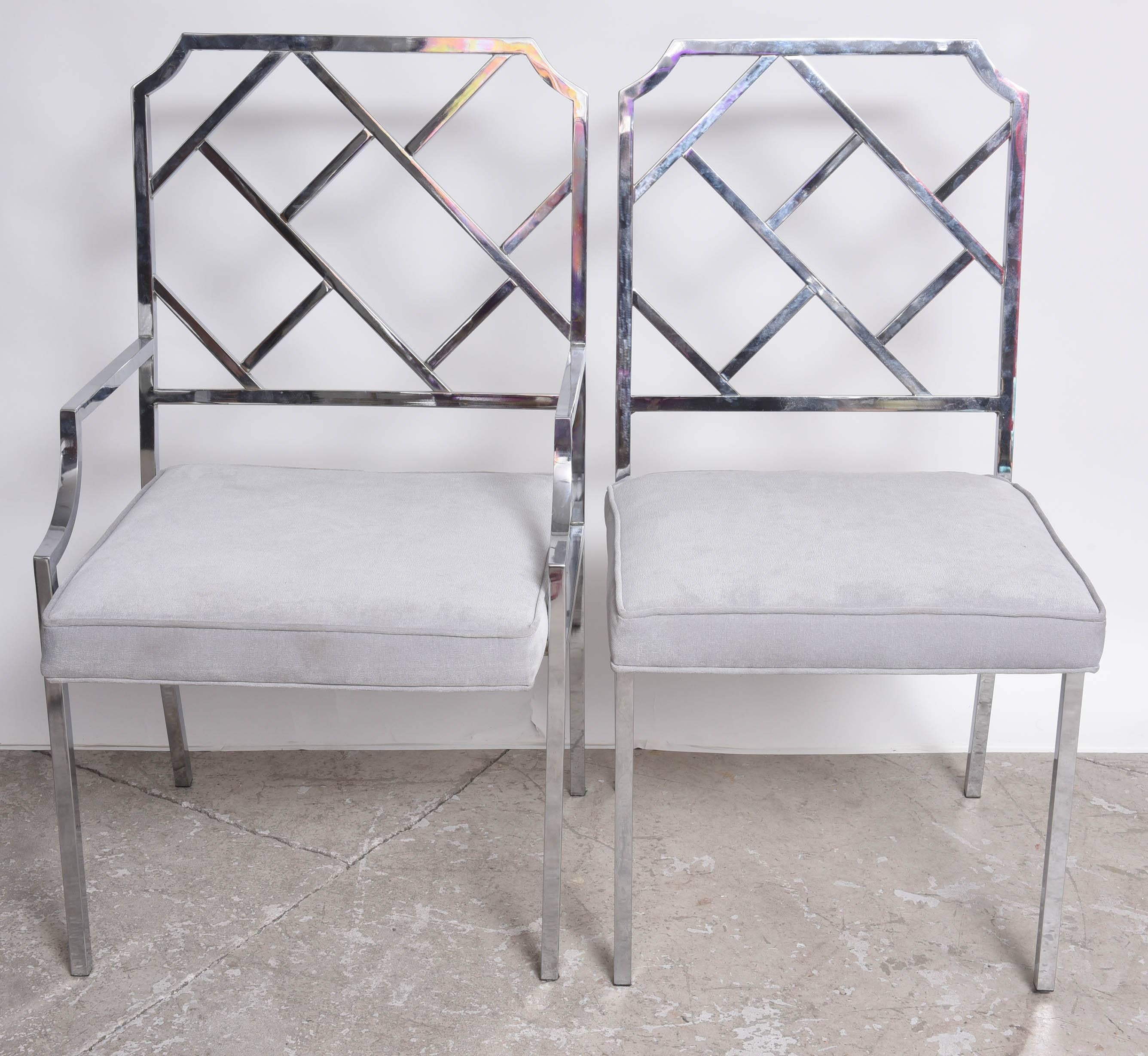 Set of four DIA (Design Institute of America) two with armrest and two without. Chairs designed by Milo Baughman, these have been reupholstered in a grey fabric; please look at photos for detail of chrome and upholstery. Size for no arms is W
