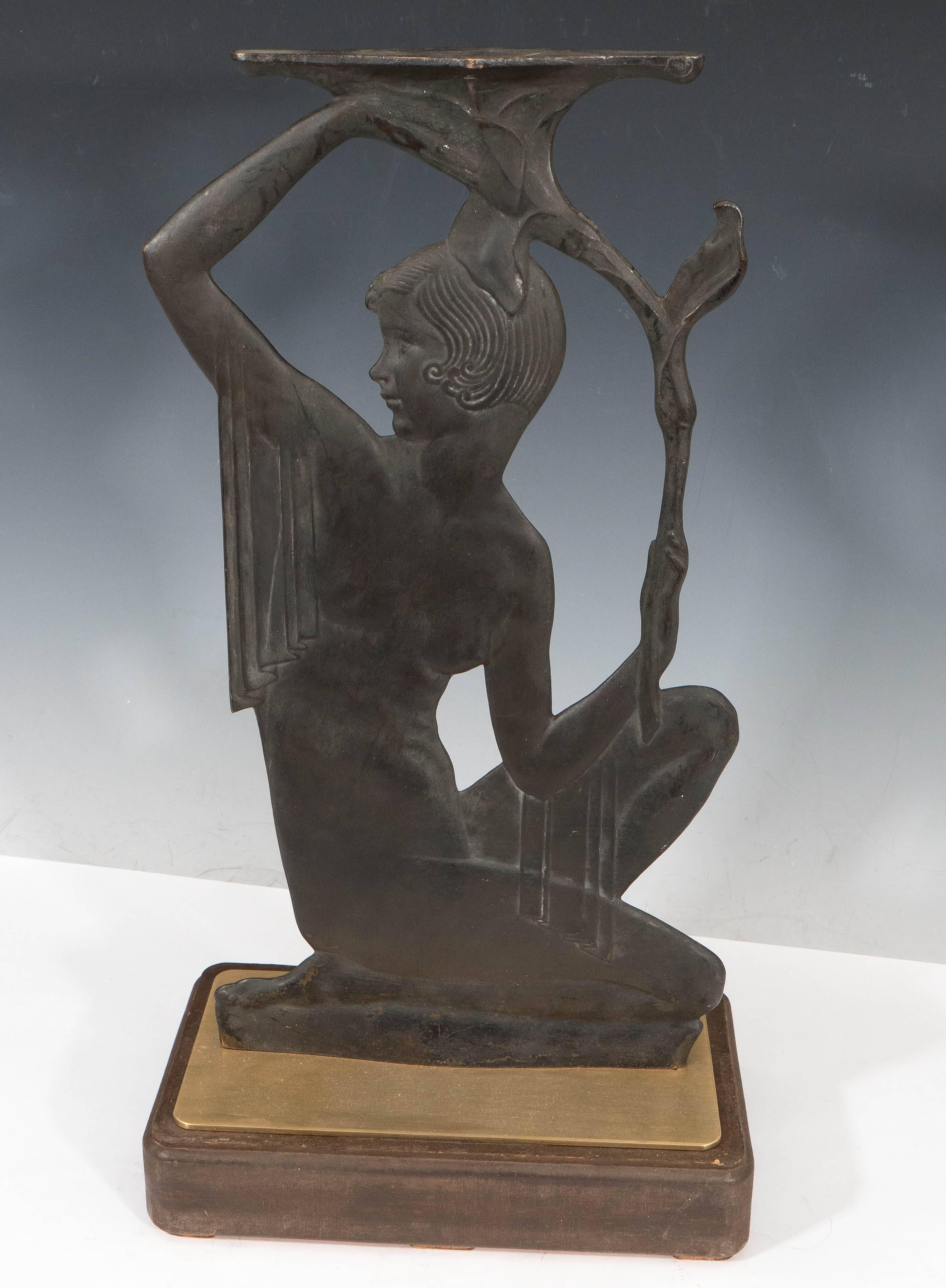 A vintage Art Deco two-dimensional bronze sculpture, by Chicago based sculptor Emory P. Seidel (1881-1954), produced within the early 20th century period. In likeness with his celebrated series of candle holders and candelabras, Seidel derives much