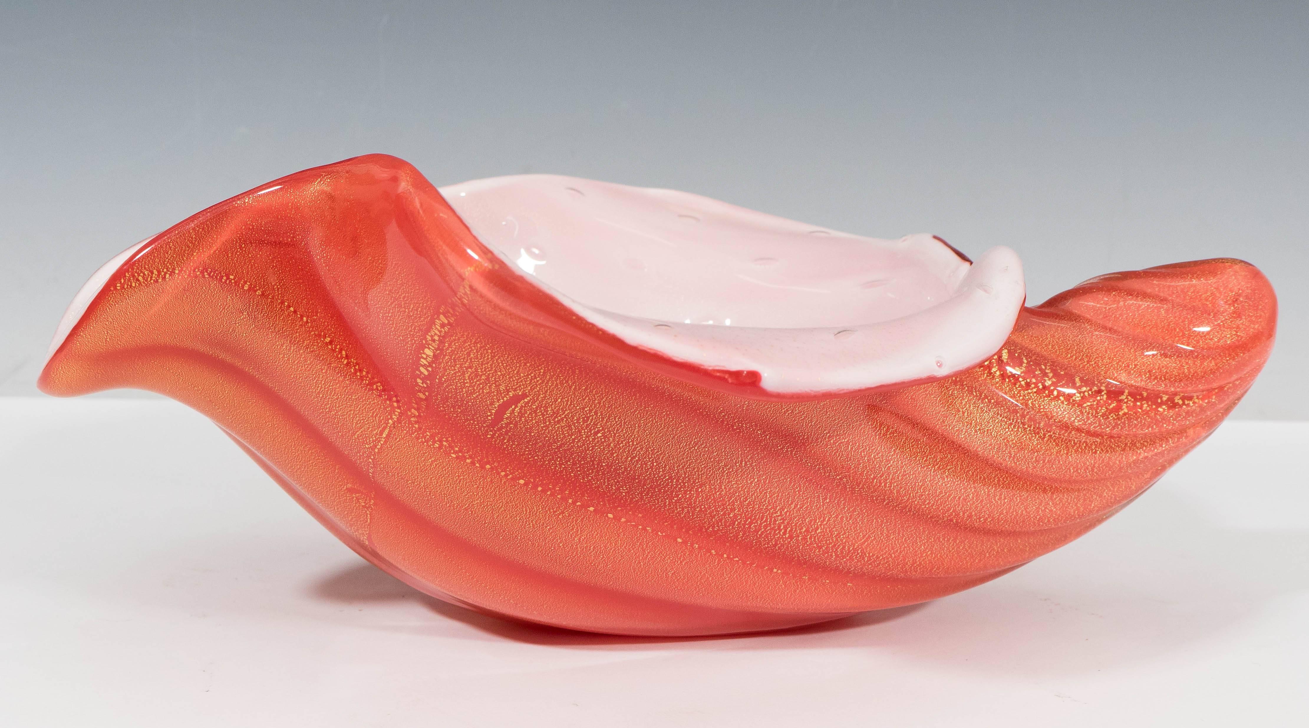 An impressive Murano, handblown glass bowl, produced in Italy, circa 1950s-1960s, by Alfredo Barbini. The intricate technique is called 'incamiciato,' where two layers of glass are combined: The inner layer is opaque white with controlled bubbles,