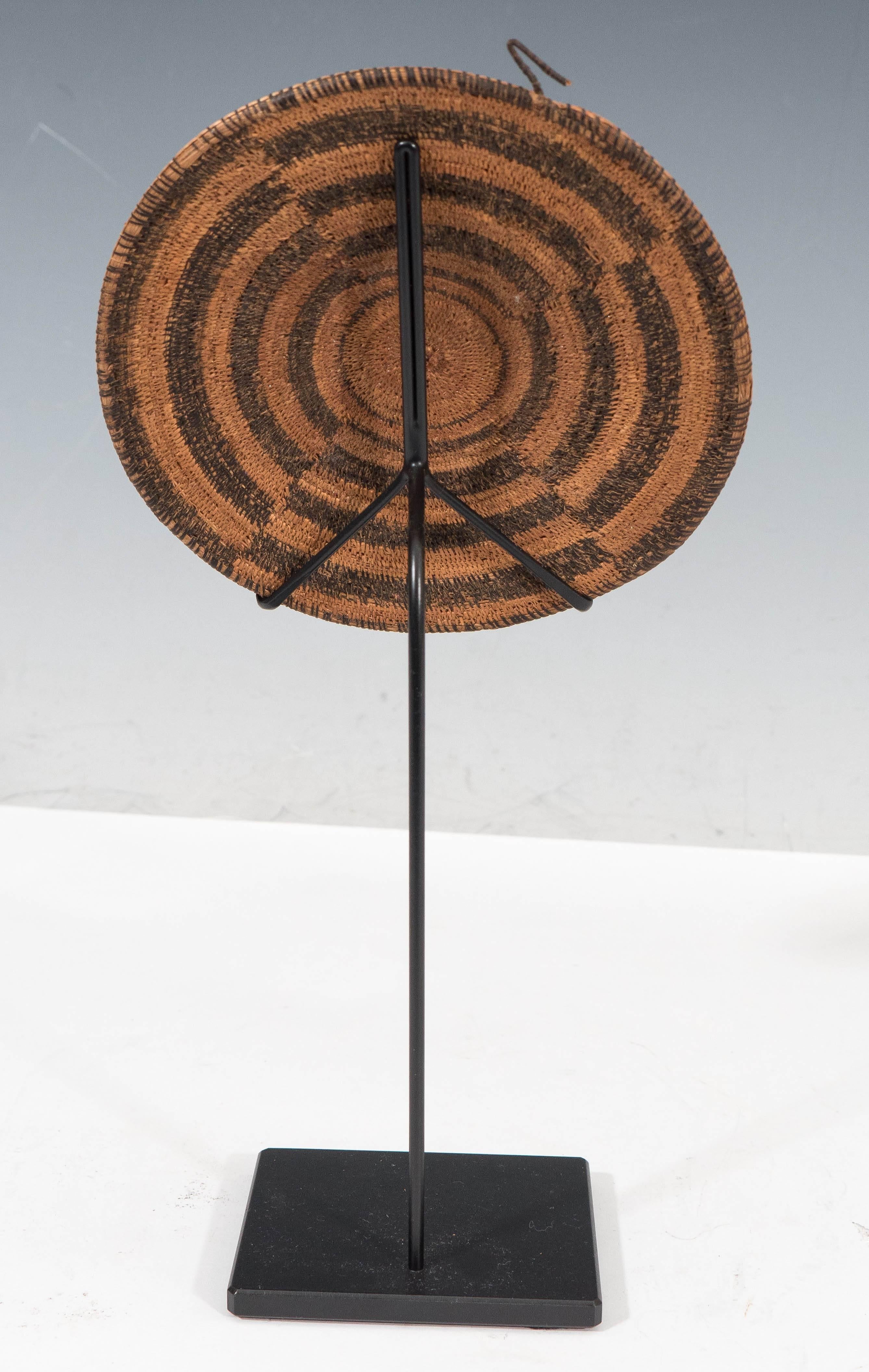 Woven Rattan Disc on Metal Stand 1