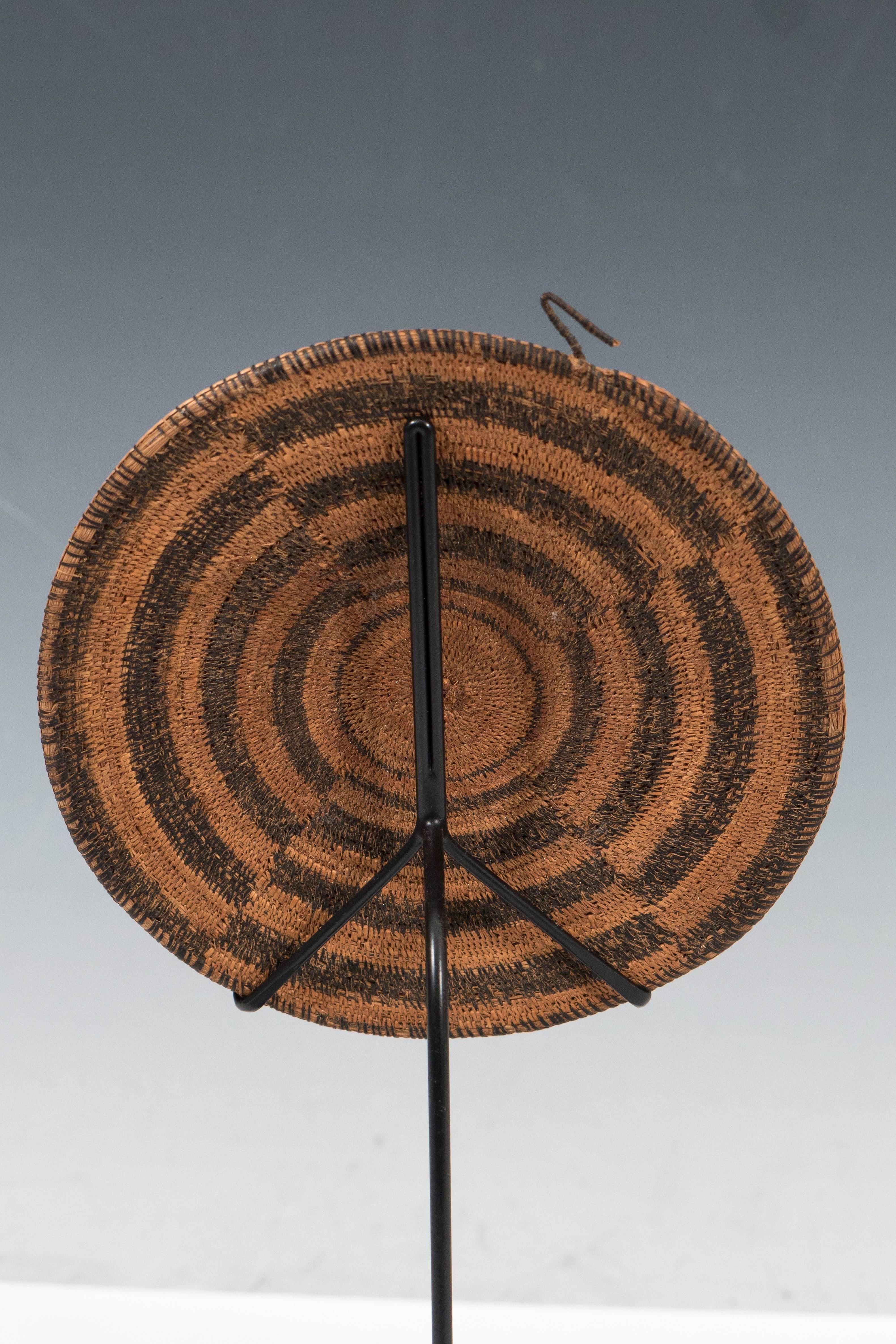 Woven Rattan Disc on Metal Stand 2