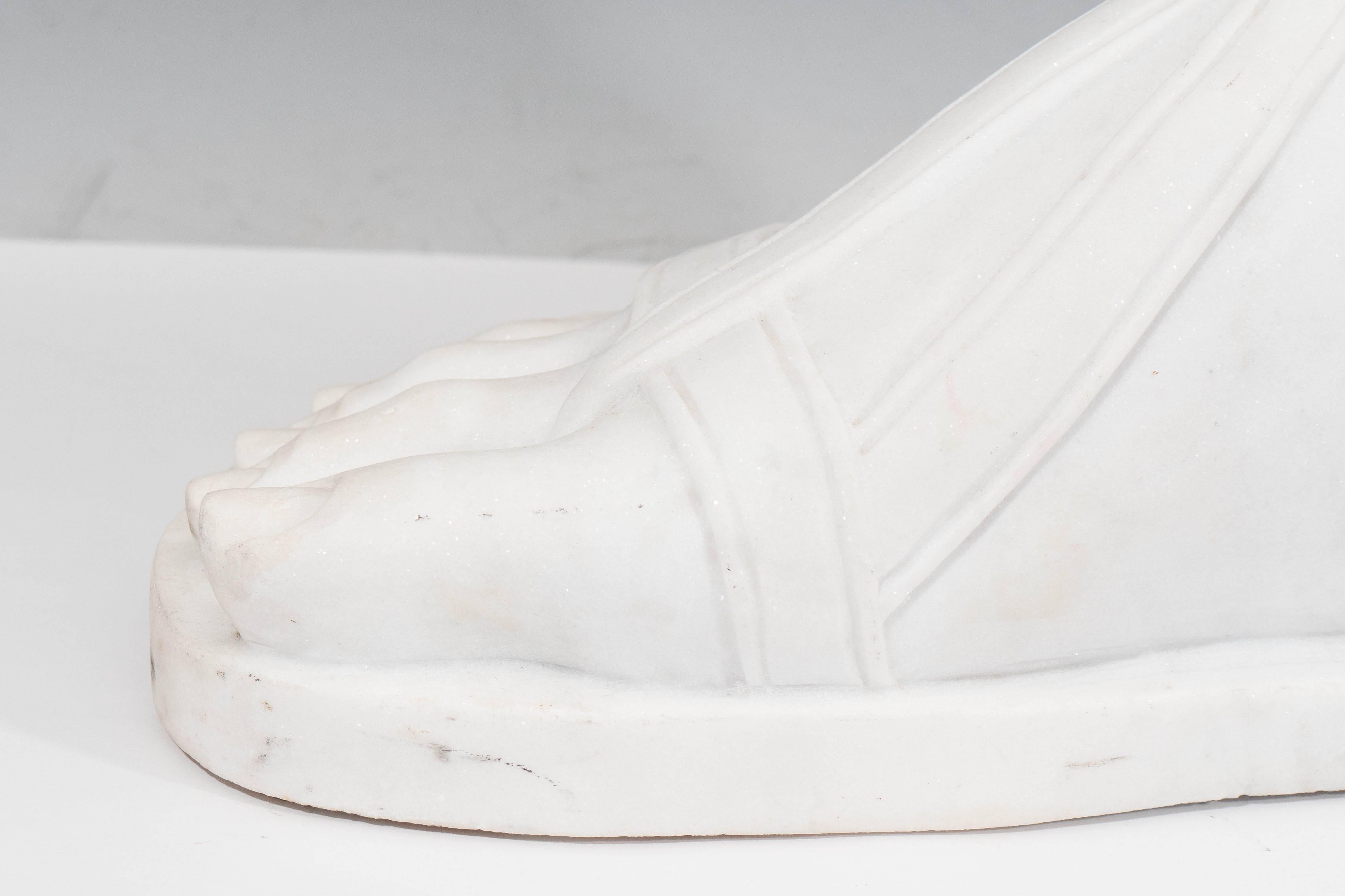 A 1970s Italian whimsical interpretation of the classical ‘Roman Centurion’ foot, carved in white Italian marble. Very good vintage condition, with some minor scuffing.