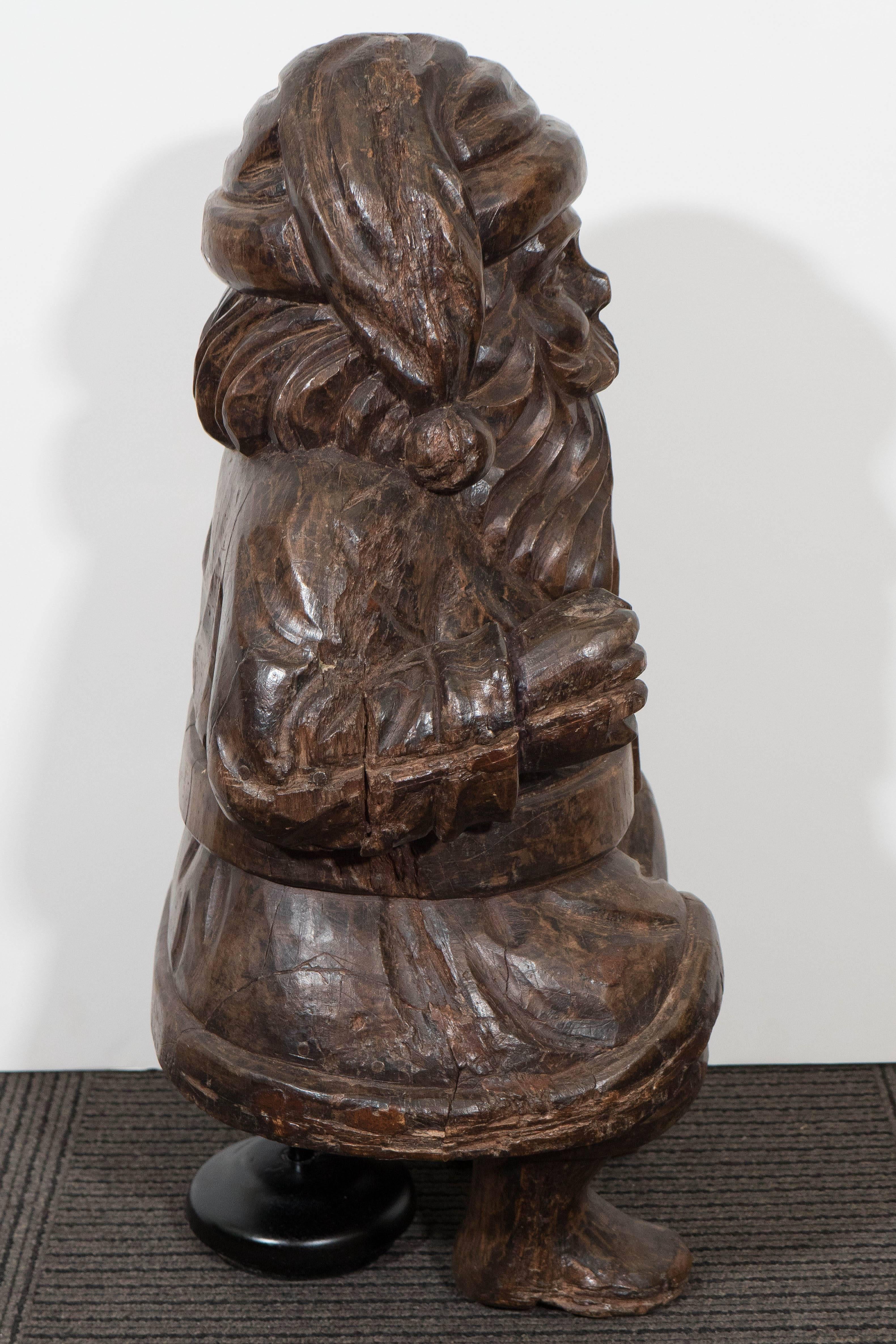 carved wood santa