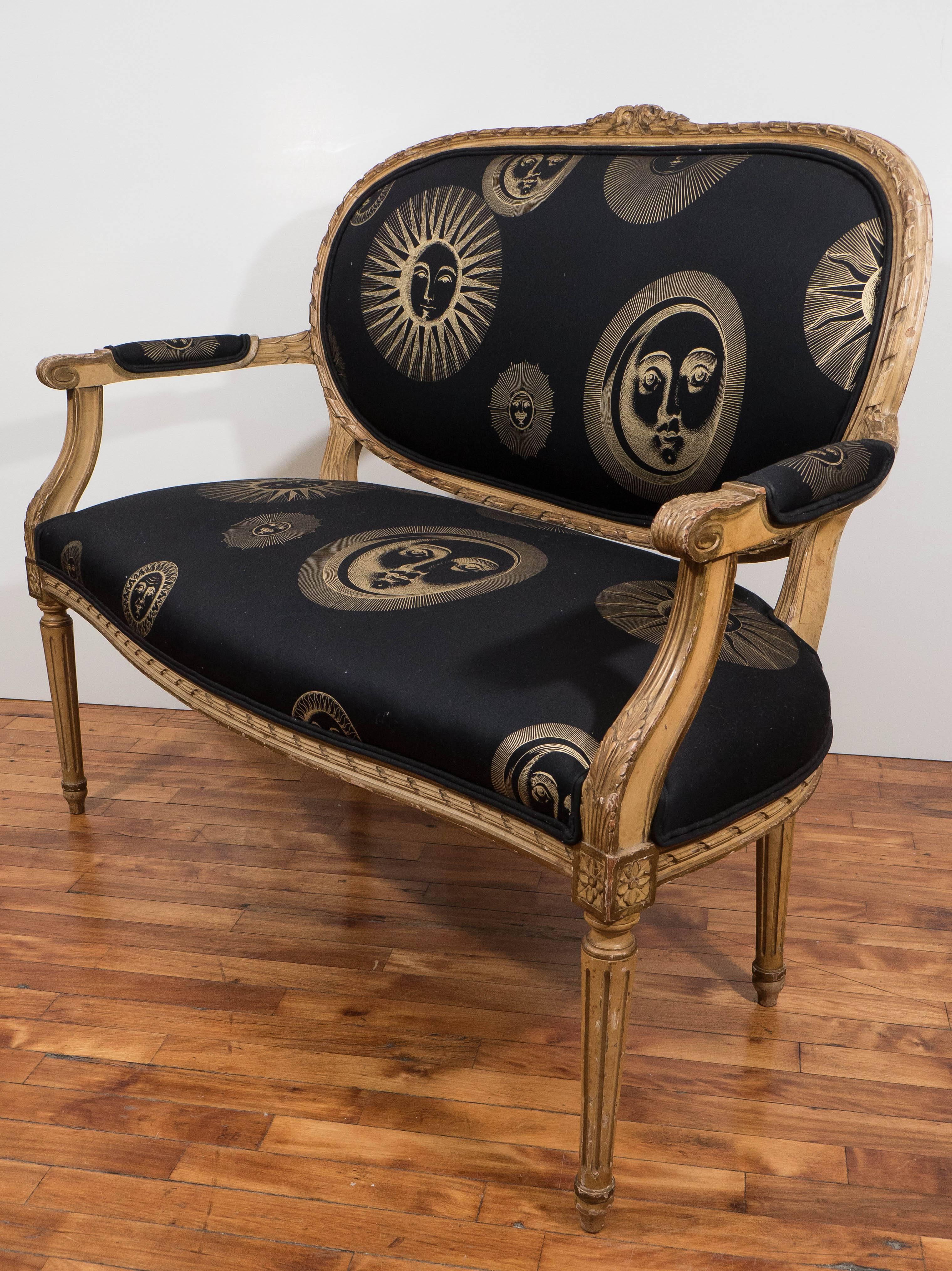 French 19th Century Louis XVI Style Settee with Black and Gold Fornasetti Fabric