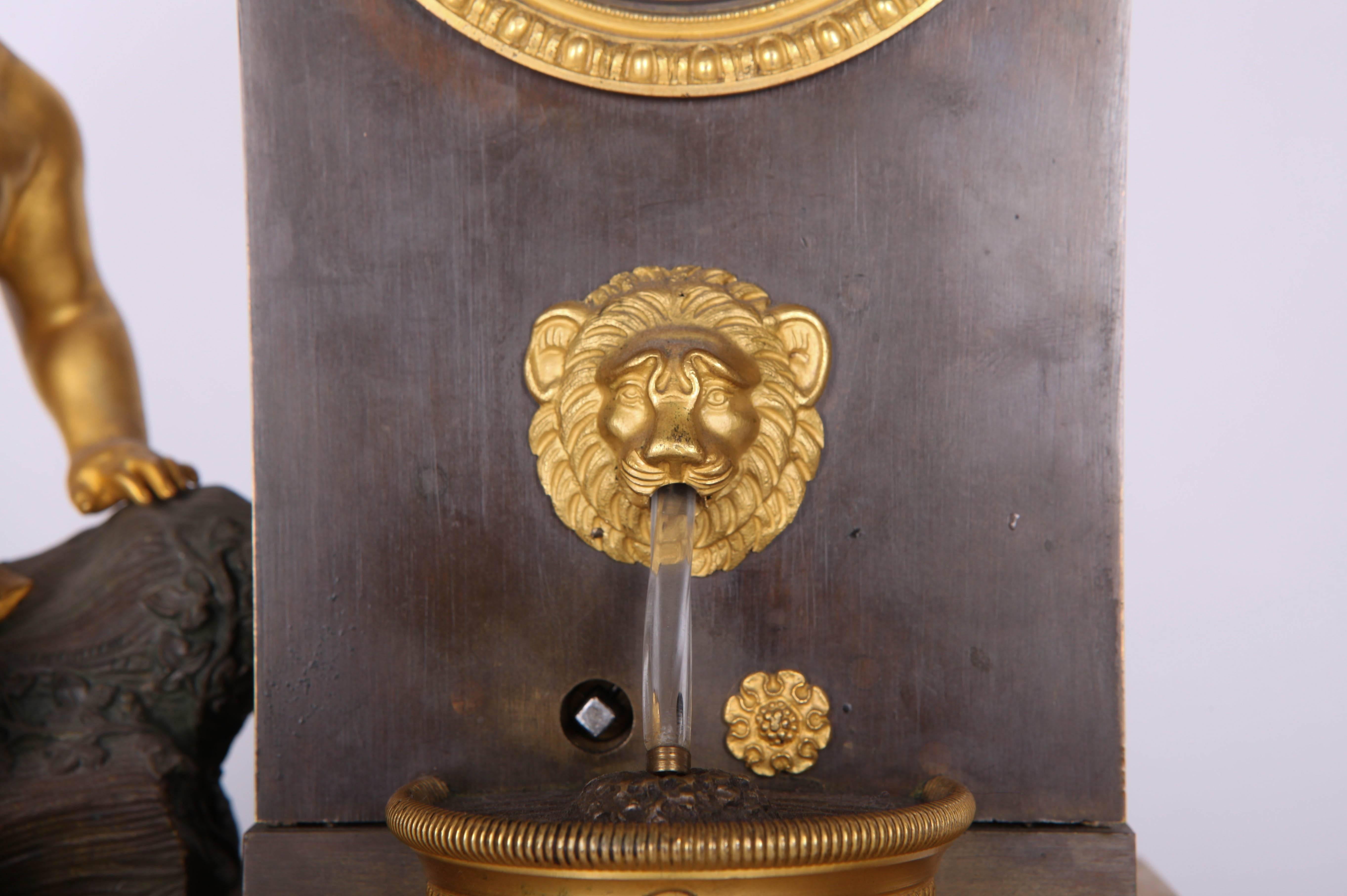 19th Century French Empire Gilt and Patinated Bronze Mantel Clock In Good Condition For Sale In Roma, IT