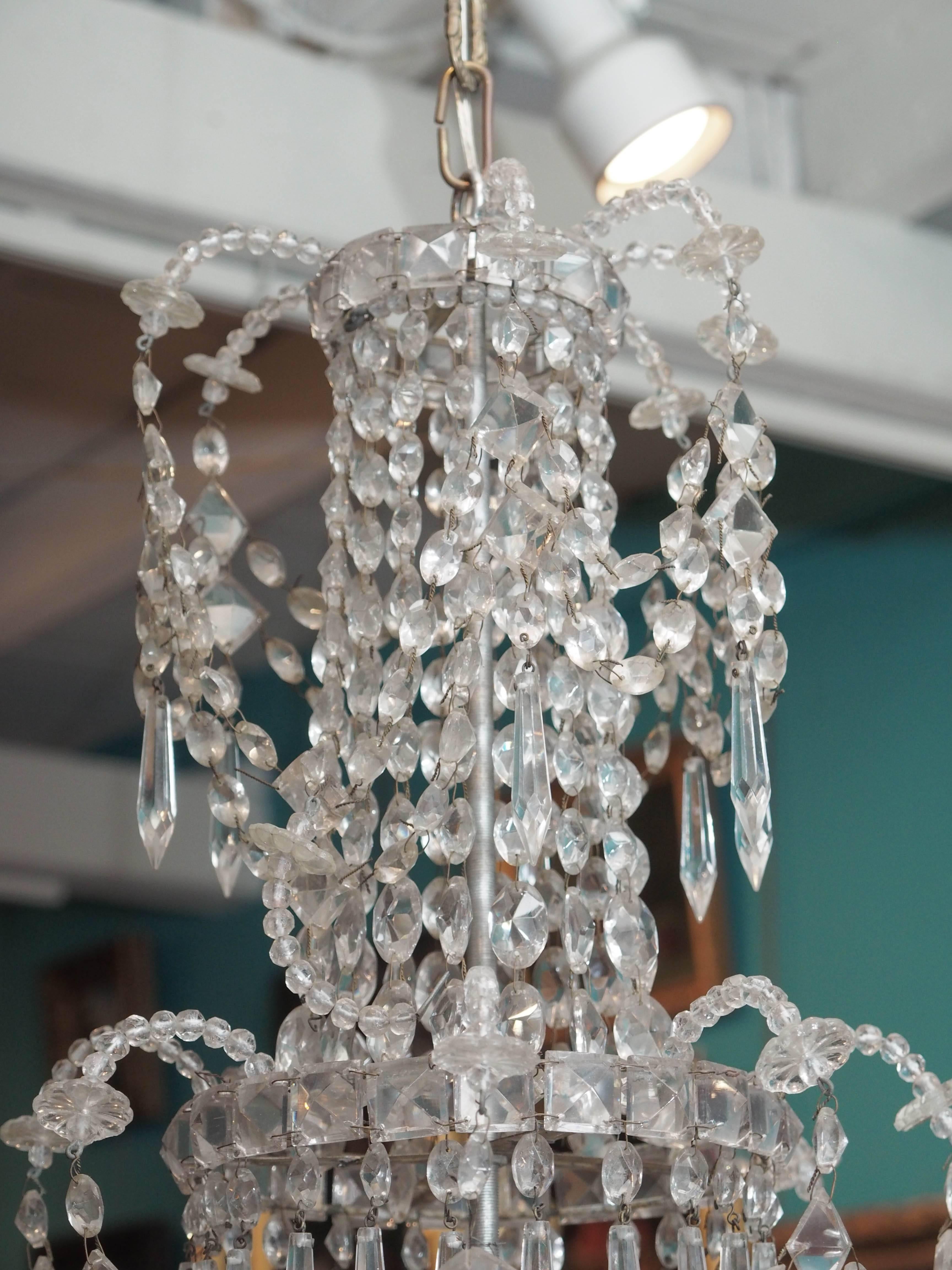 Early 19th century French Charles X period crystal chandelier with eight arms.