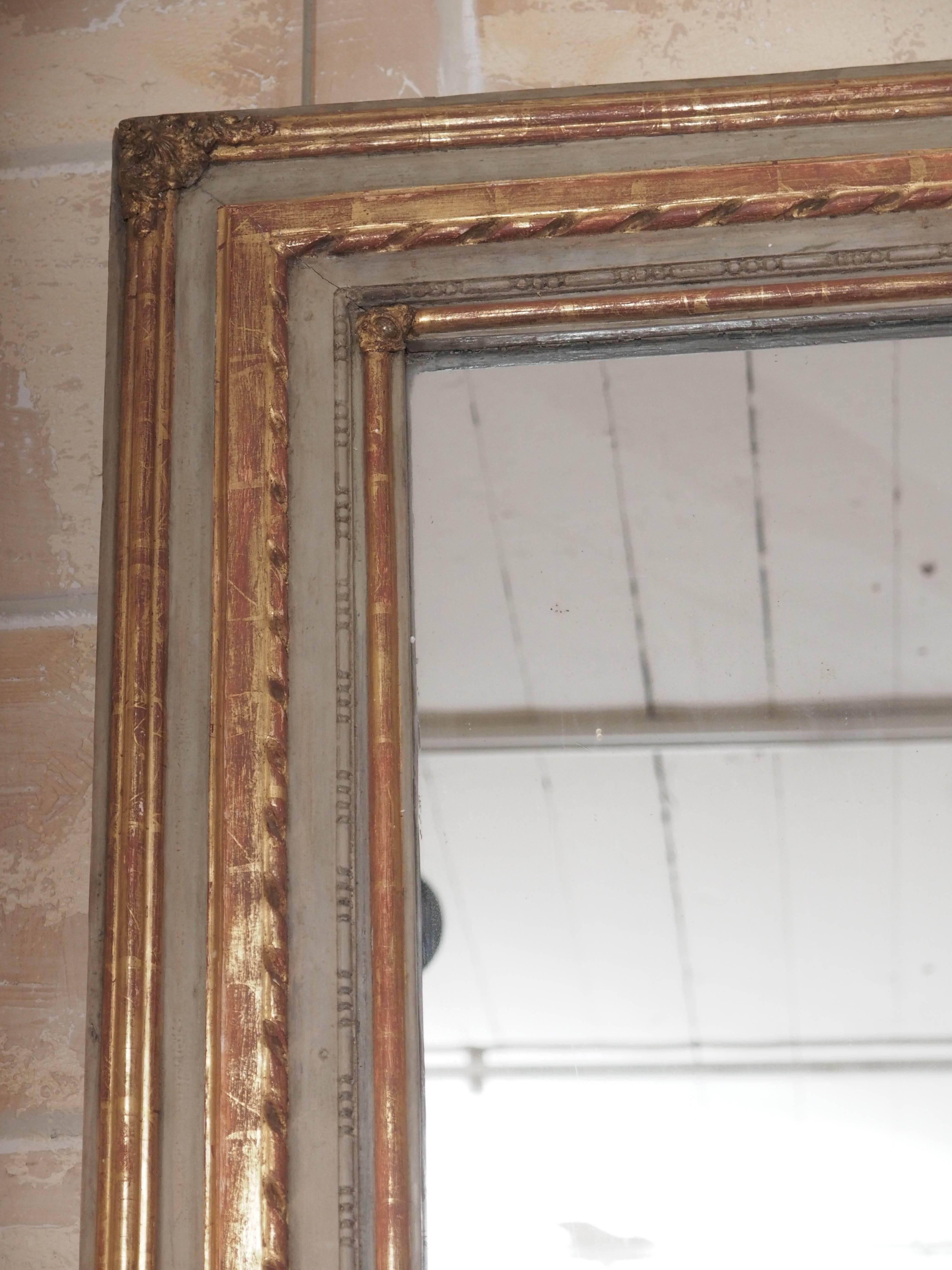 Grand late 18th century French painted and gilded mirror