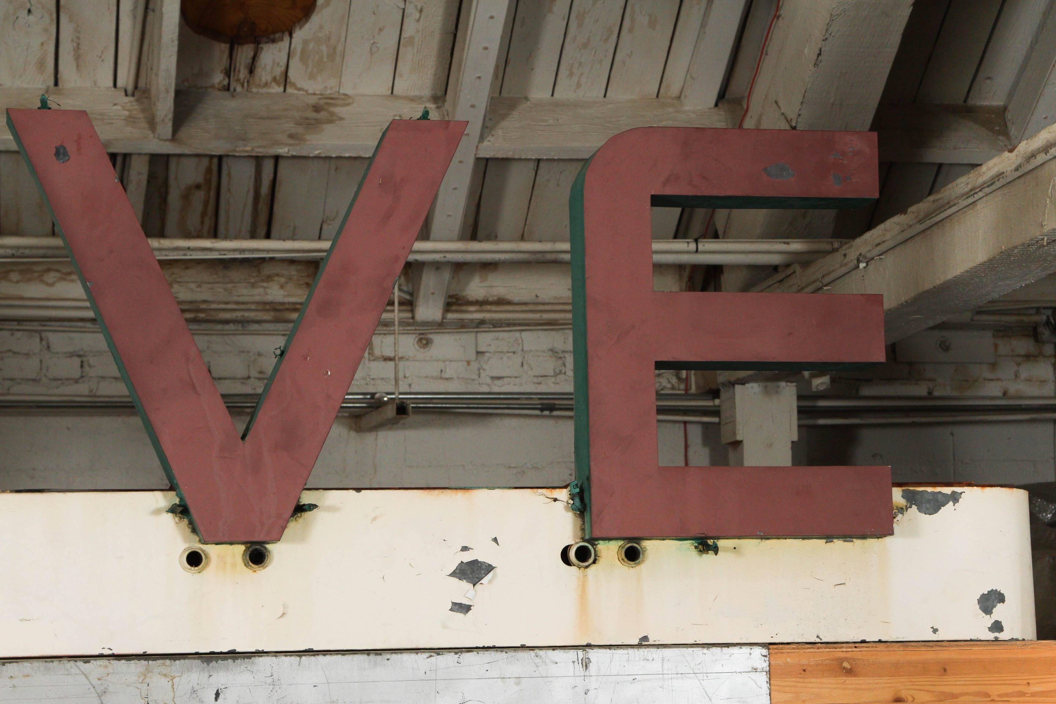 Original Art Deco Metal Sign reads OLIVE, 12 Feet Long In Fair Condition For Sale In santa monica, CA