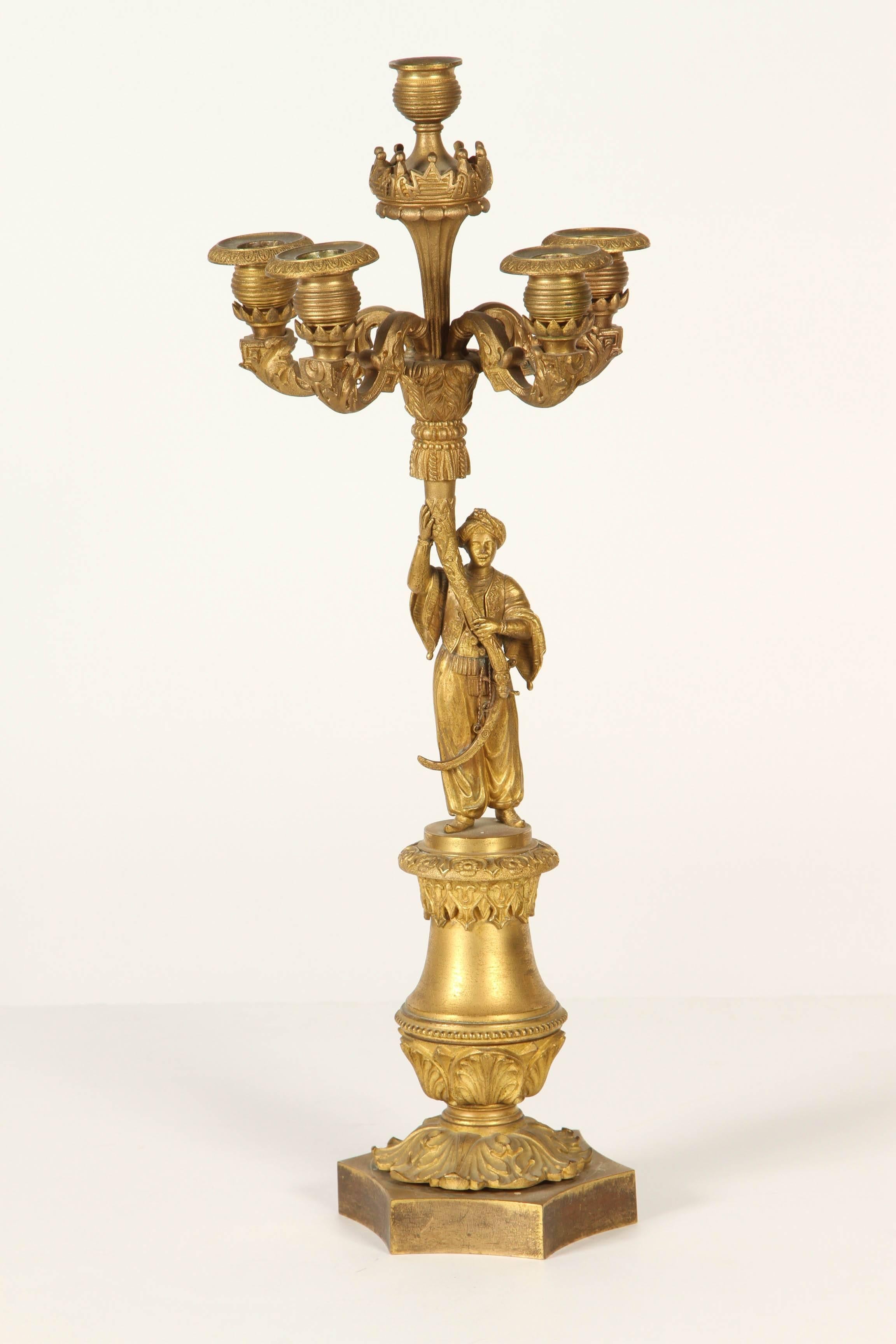 Pareja de candelabros de bronce dorado siglo XIX en venta
