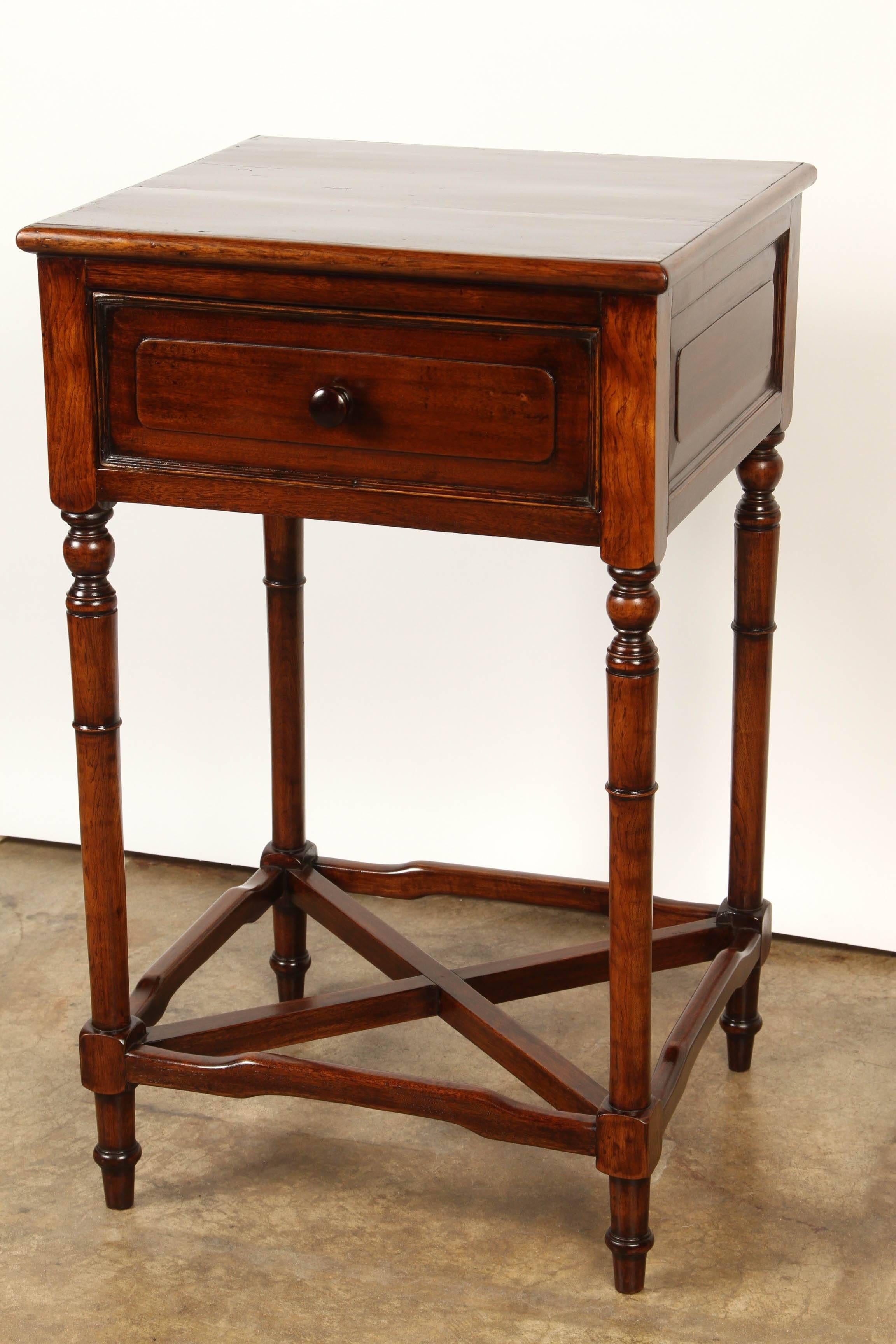 Made for the Local French market, this Vietnamese console table is made from Solid indigenous rosewood. The top of this rosewood table is supported by four turned legs and a central stretcher.