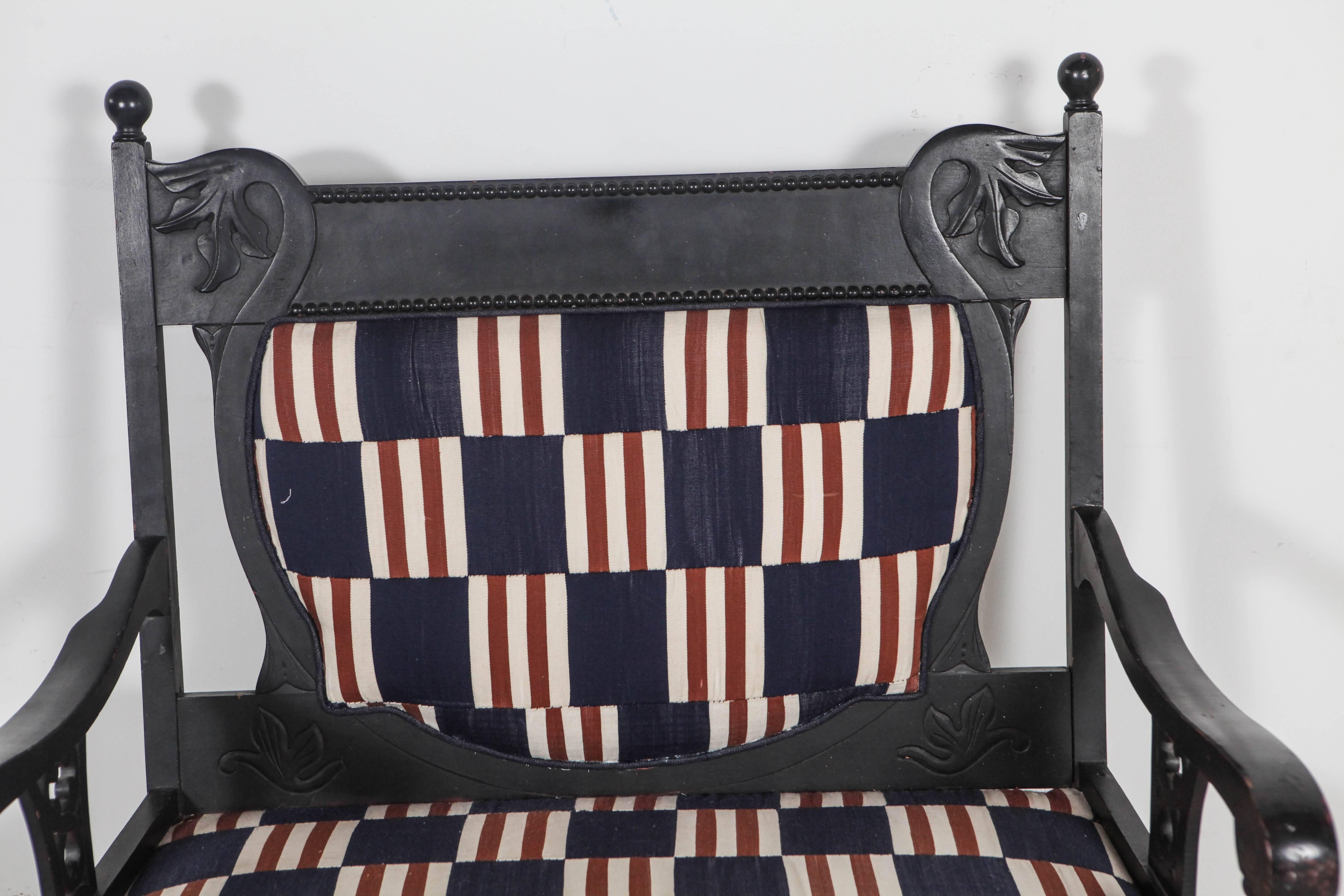 Striking silhouettes with bold graphic patterns and colors on Edwardian style settee. Larger size also available.