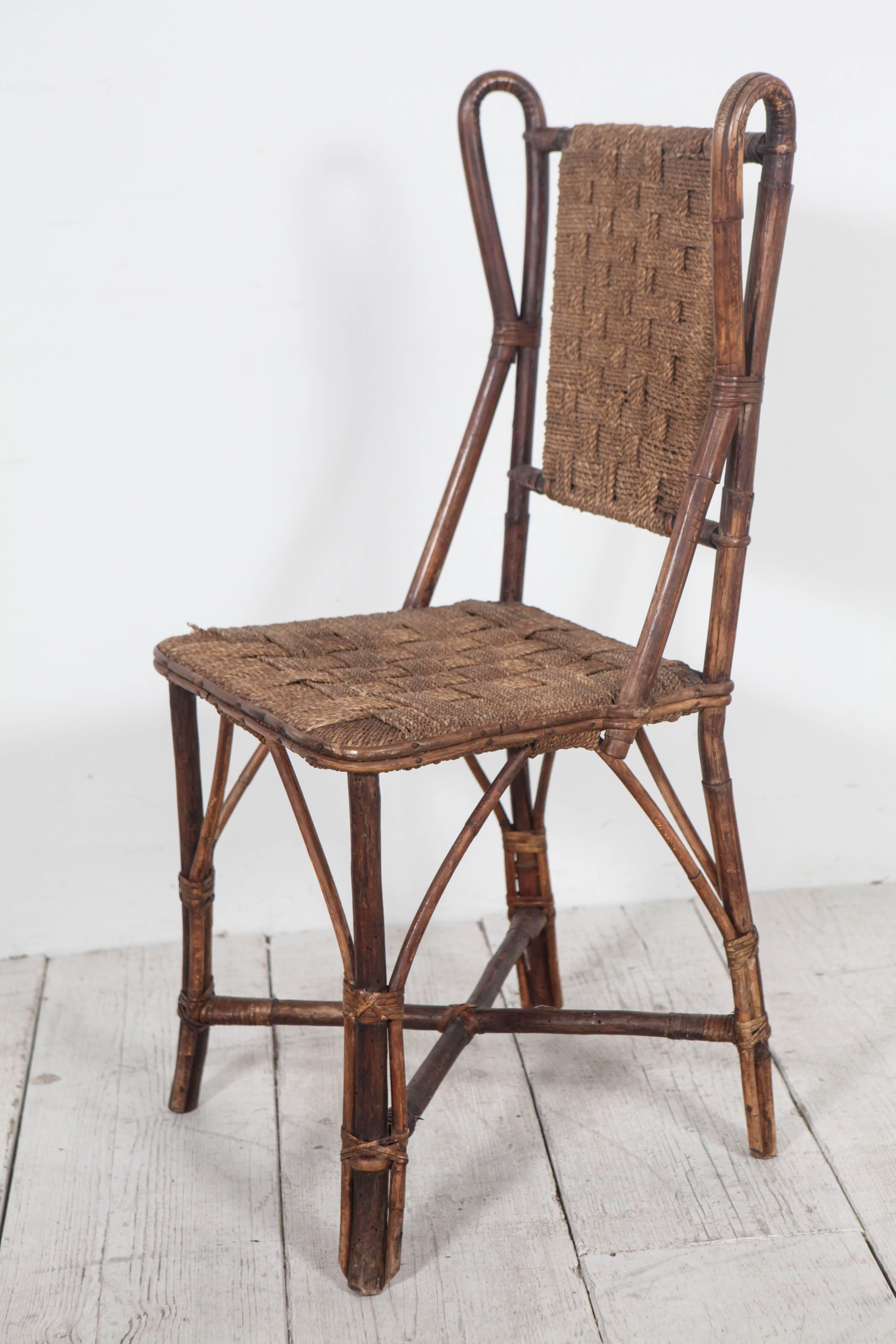 Bamboo and rush seat dining chair. One chair available.