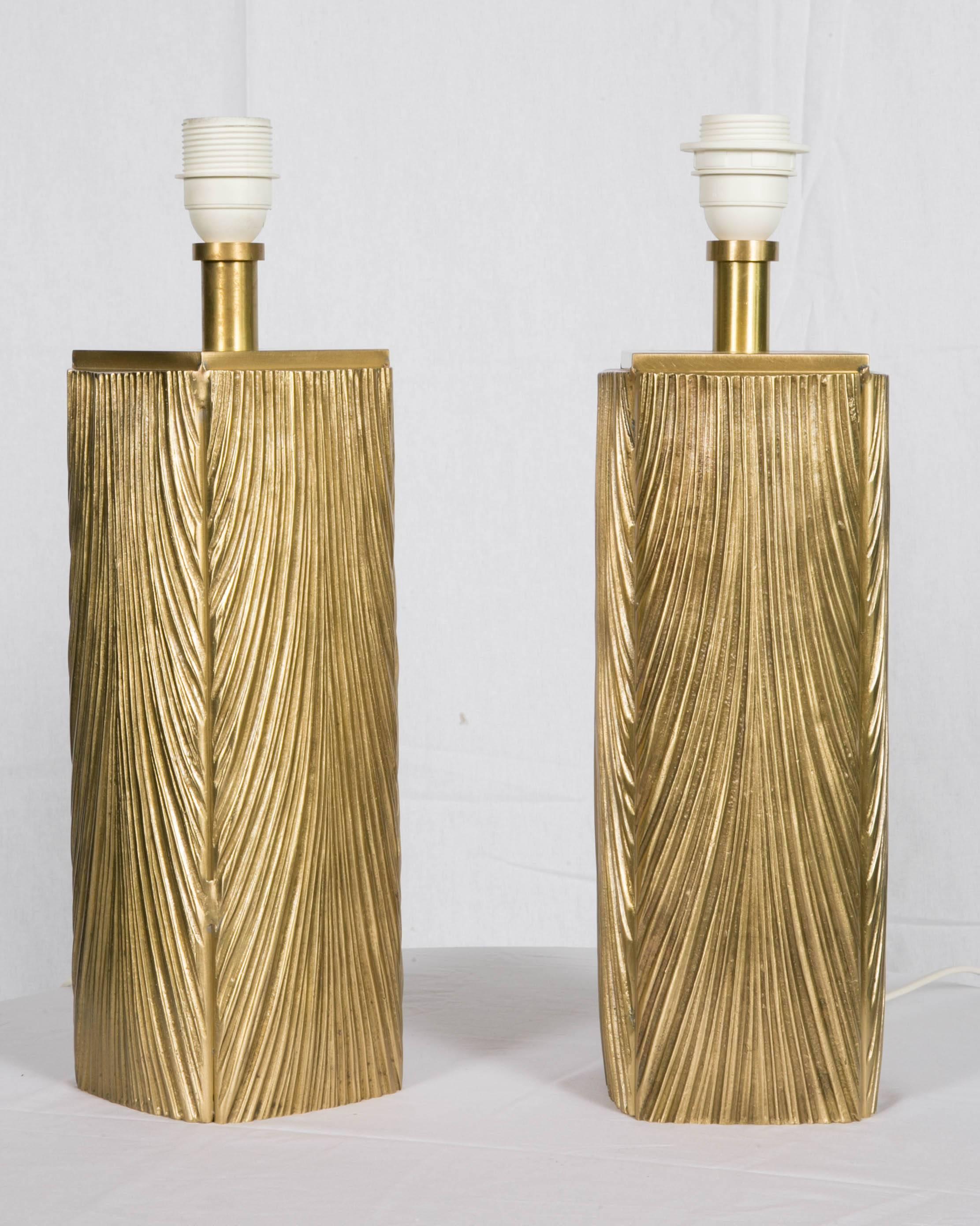 Sculptural pair of cast bronze lamps.
They are signed Luciano Frigerio,
Italy, 1970.

We can provide documentation and a 