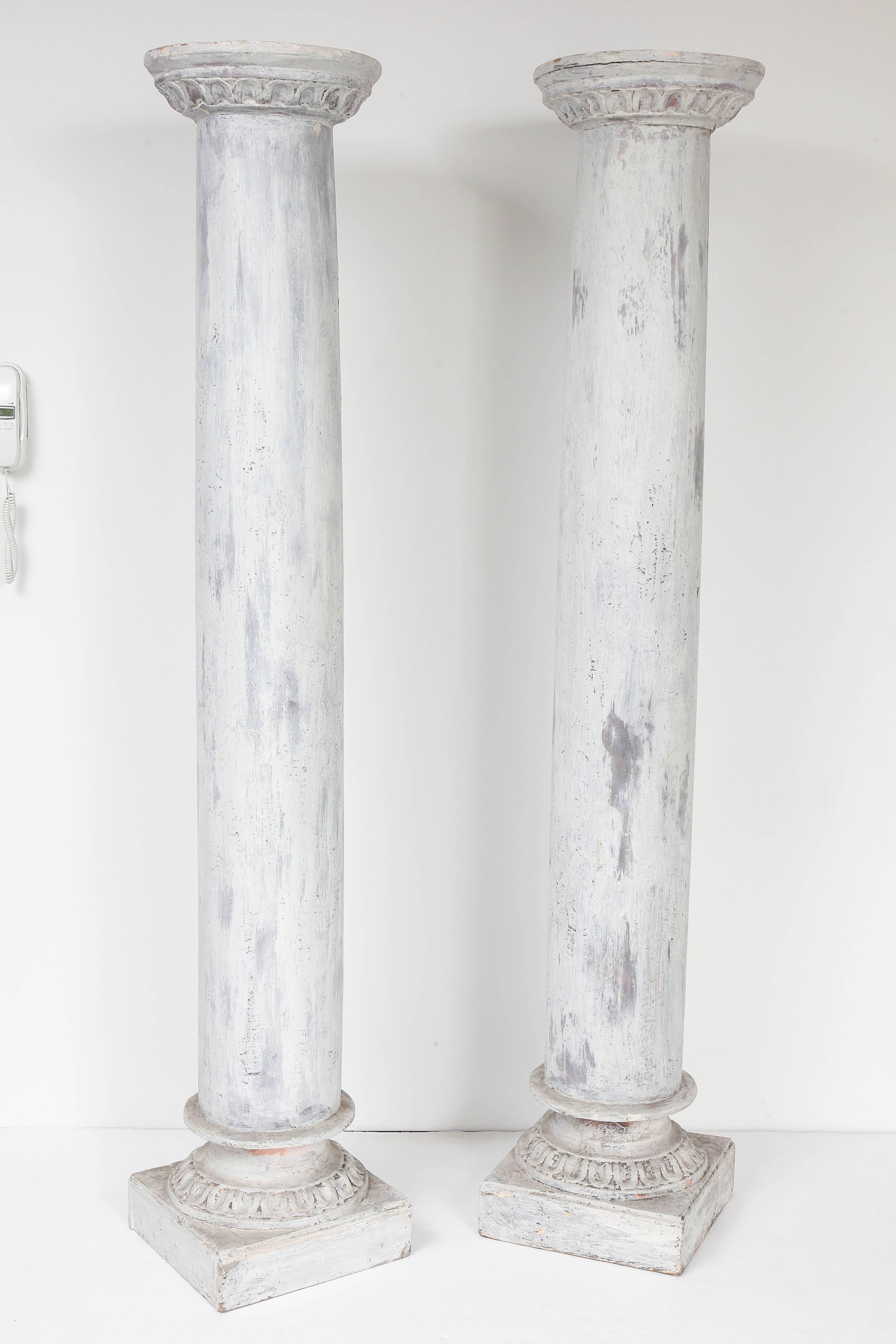 A fabulous pair of painted wood columns. From a theater in the south of France, these will add architectural interest and a bit of drama to any space.