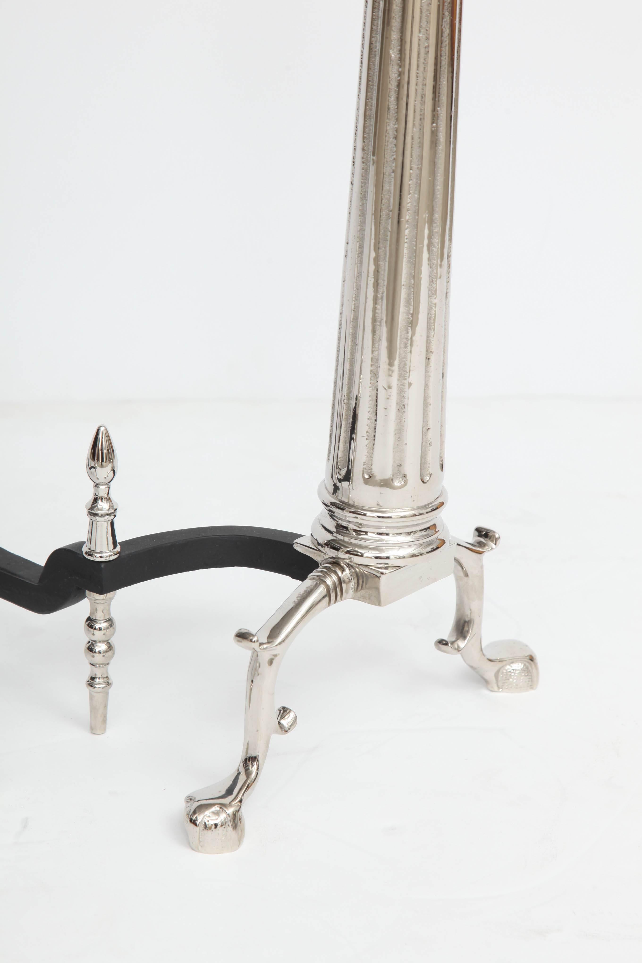 Polished Pair of Art Deco Ionic Column Andirons with Urn Finials