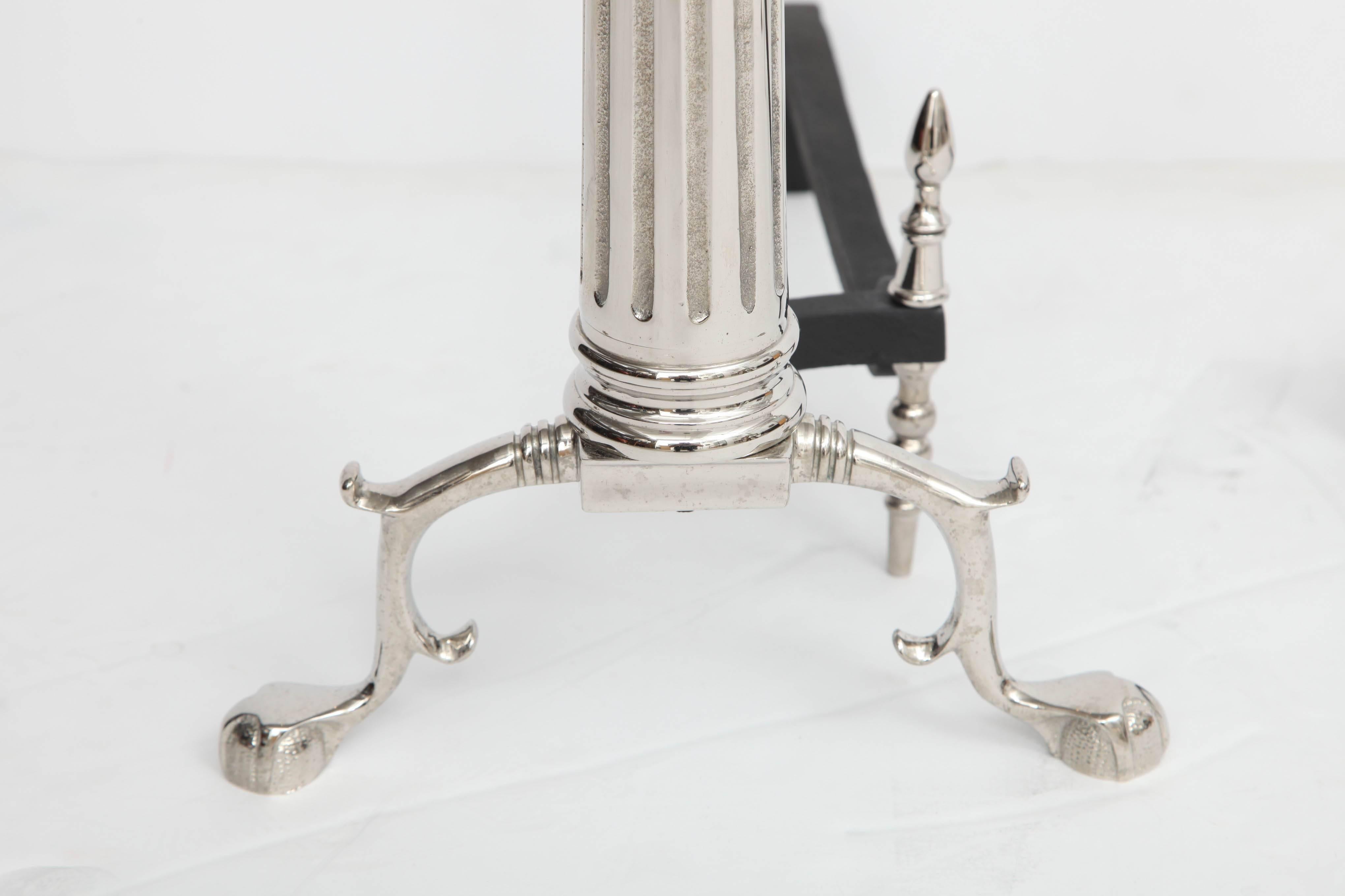 Nickel Pair of Art Deco Ionic Column Andirons with Urn Finials