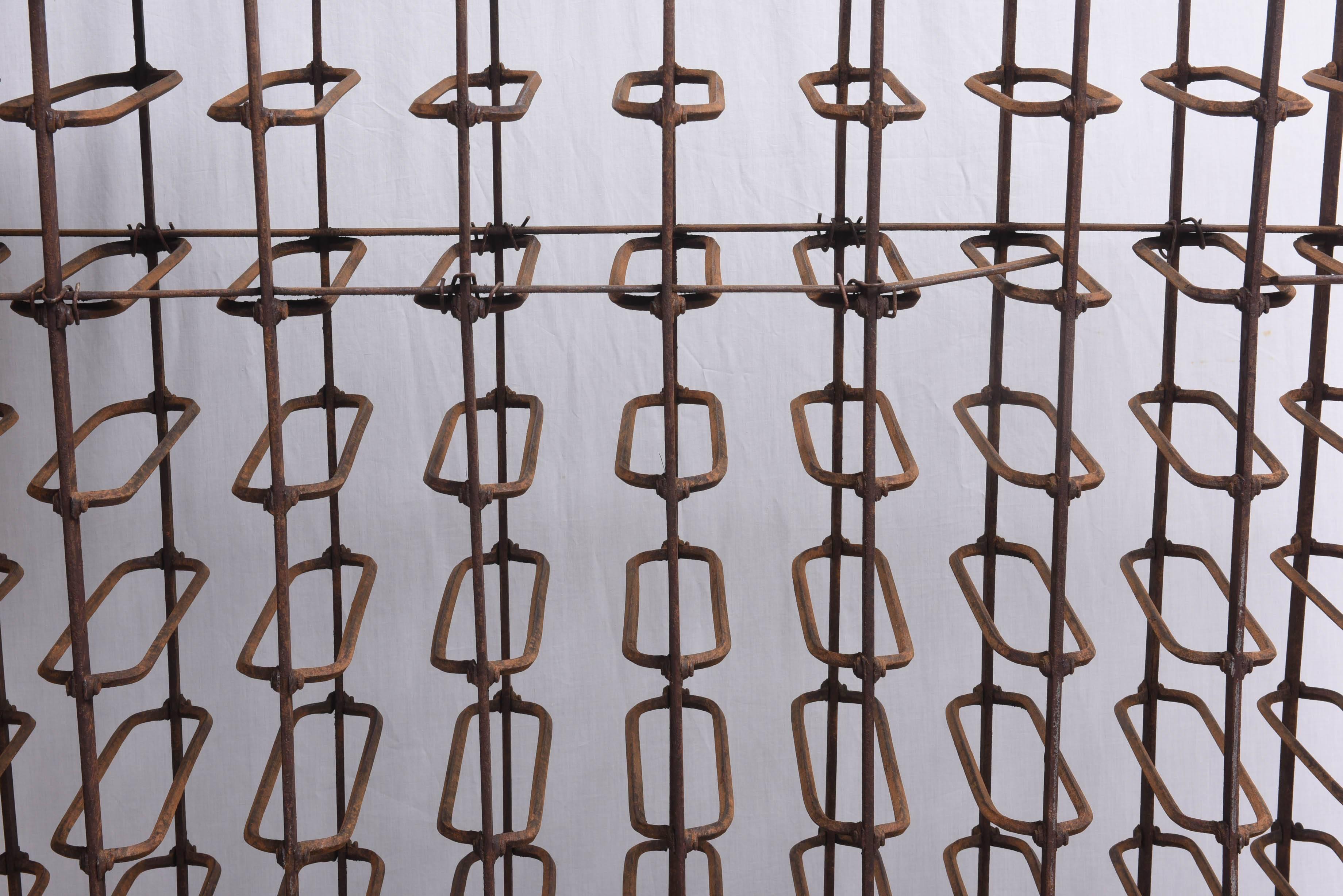 Rare 120-Bottle Capability Iron Wine Bottle Rack, France, circa 1940  In Good Condition In West Palm Beach, FL