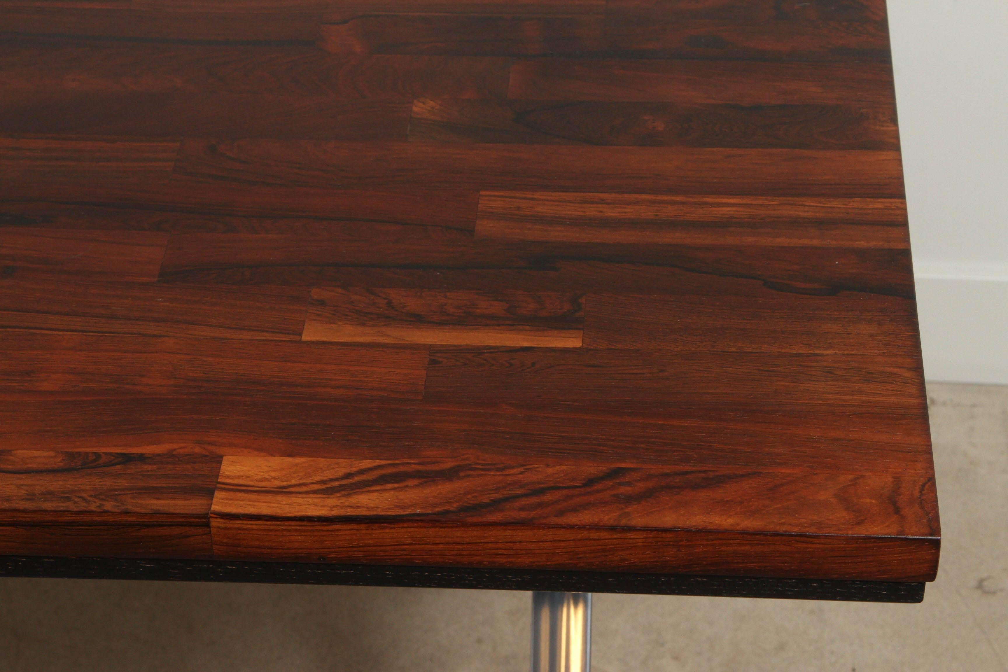 Solid rosewood desk with stainless base by Jules Heumann for Metropolitan Group.