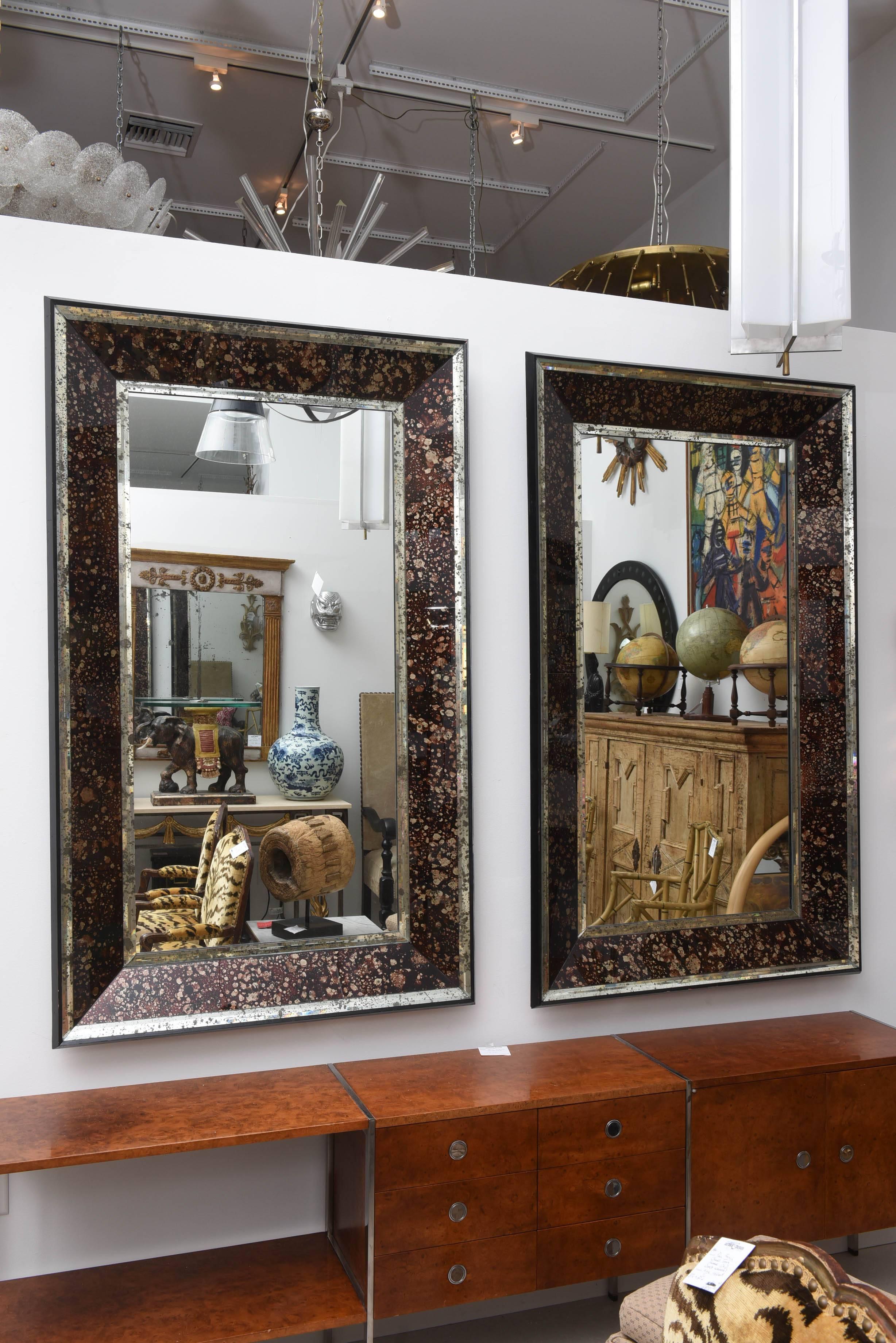 Wonderfully chic pair of faux tortoise mirrors- reverse painted.
