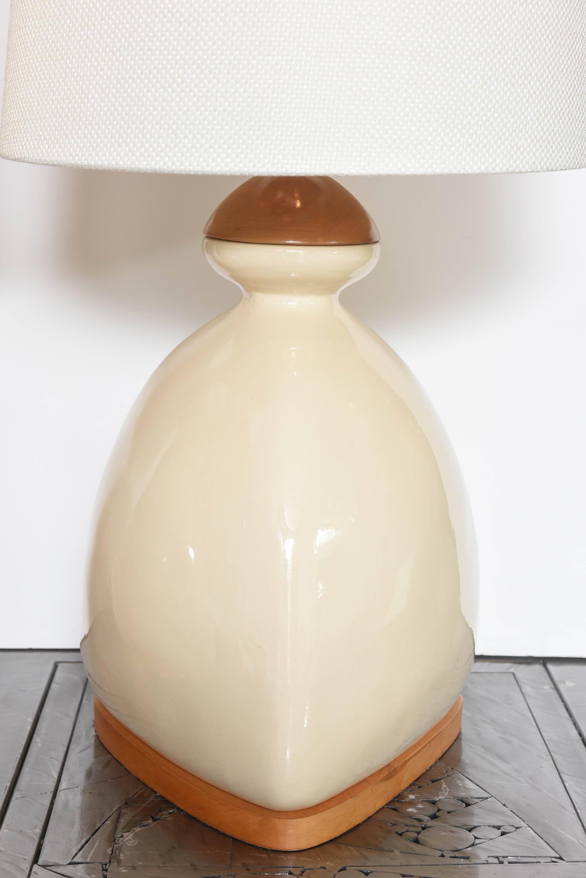 Pair of Scandinavian table lamps, beche, ceramic and wood, substantial, contemporary. Lamps can support a much large, taller and wider shade.
Shades are for display only.