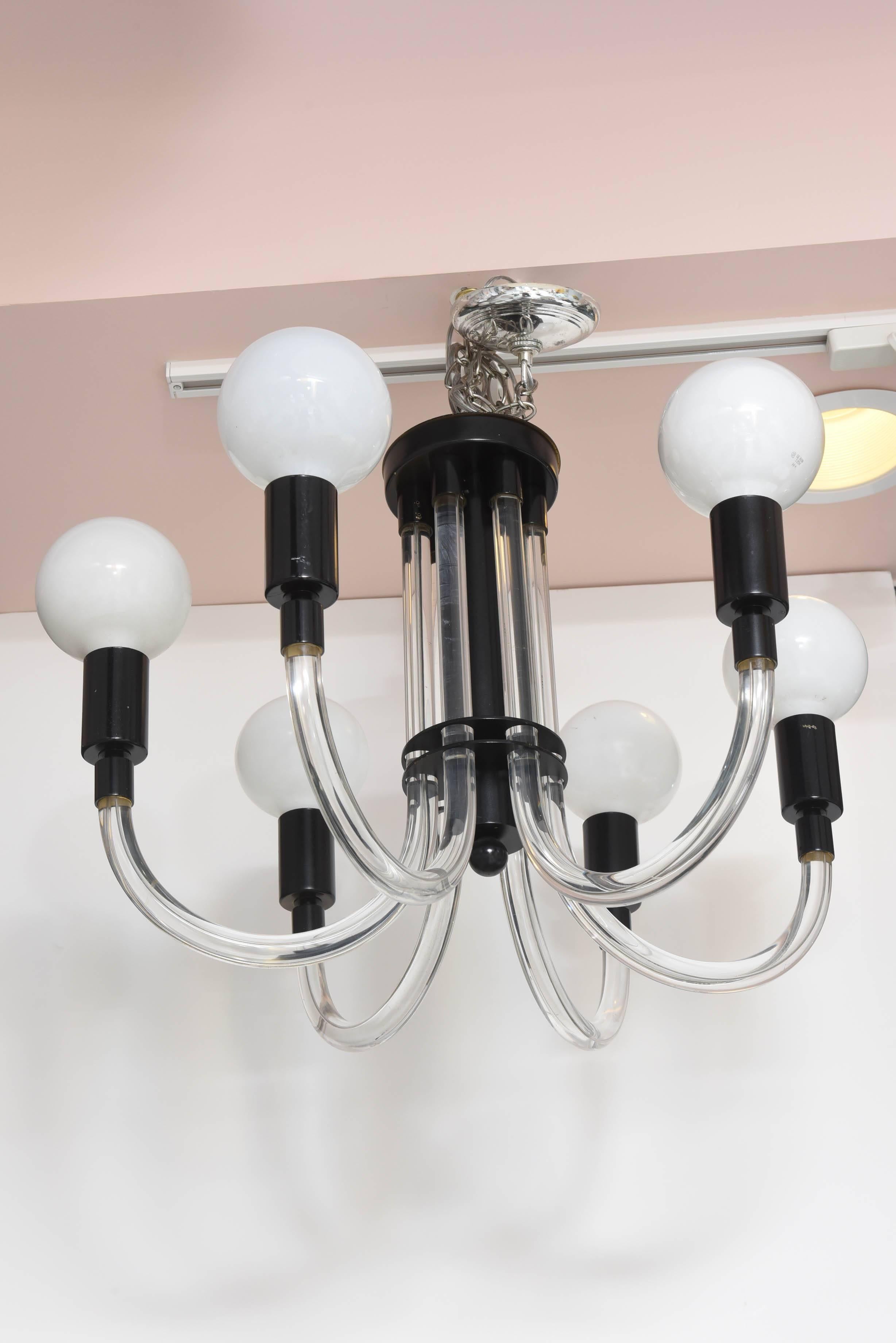 Bulbs can be customed.
Measurement given is for fixture only (not the chain). Black and clear Lucite.