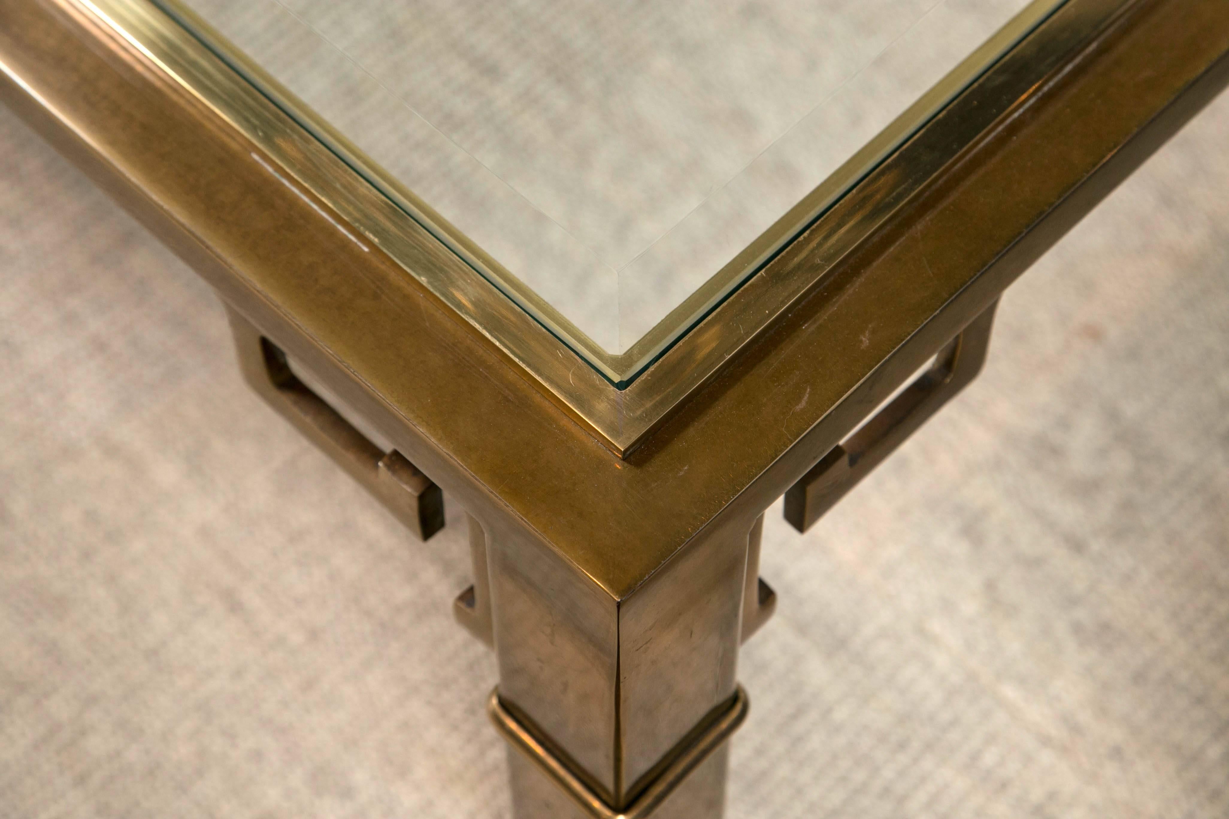 Brass rectangular Greek key coffee table.