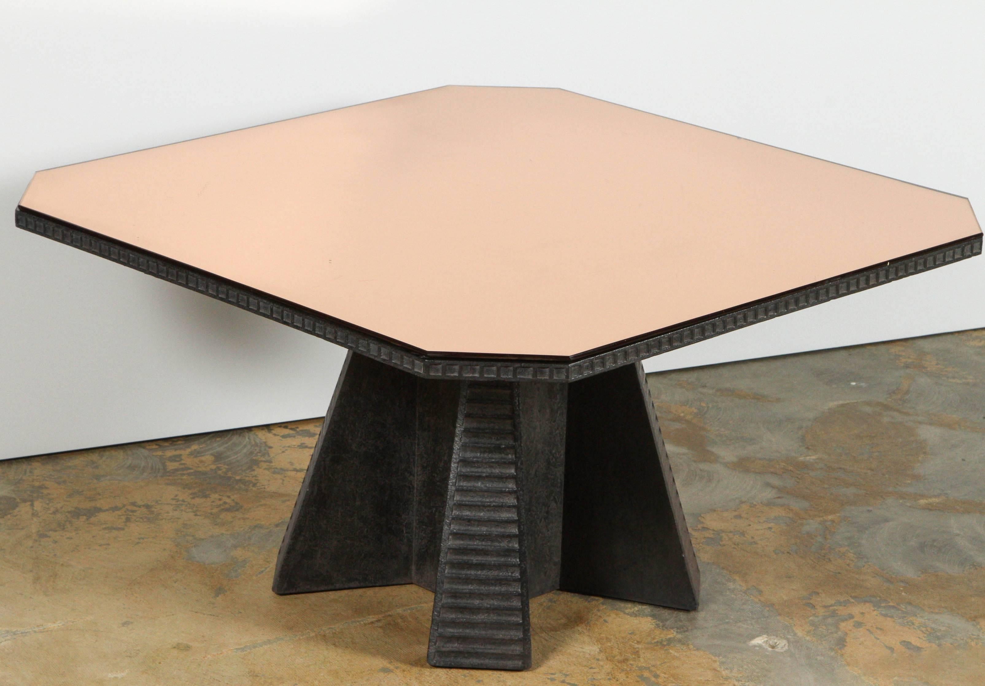 Cocktail table with refinished detailed base and original copper peach octagonal inset top.