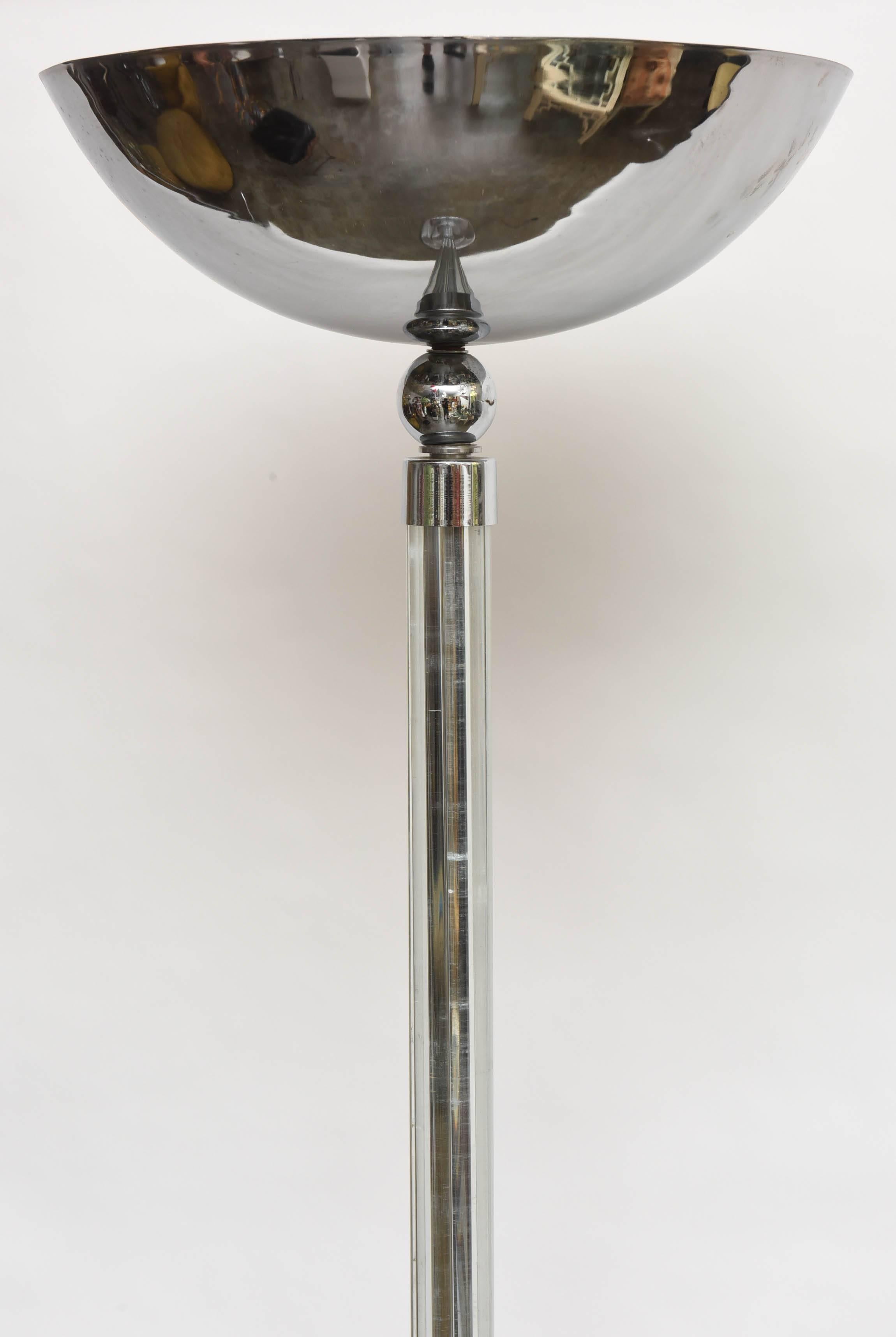 Sleek mid-century modern chrome floor lamp with beautiful glass center rods.