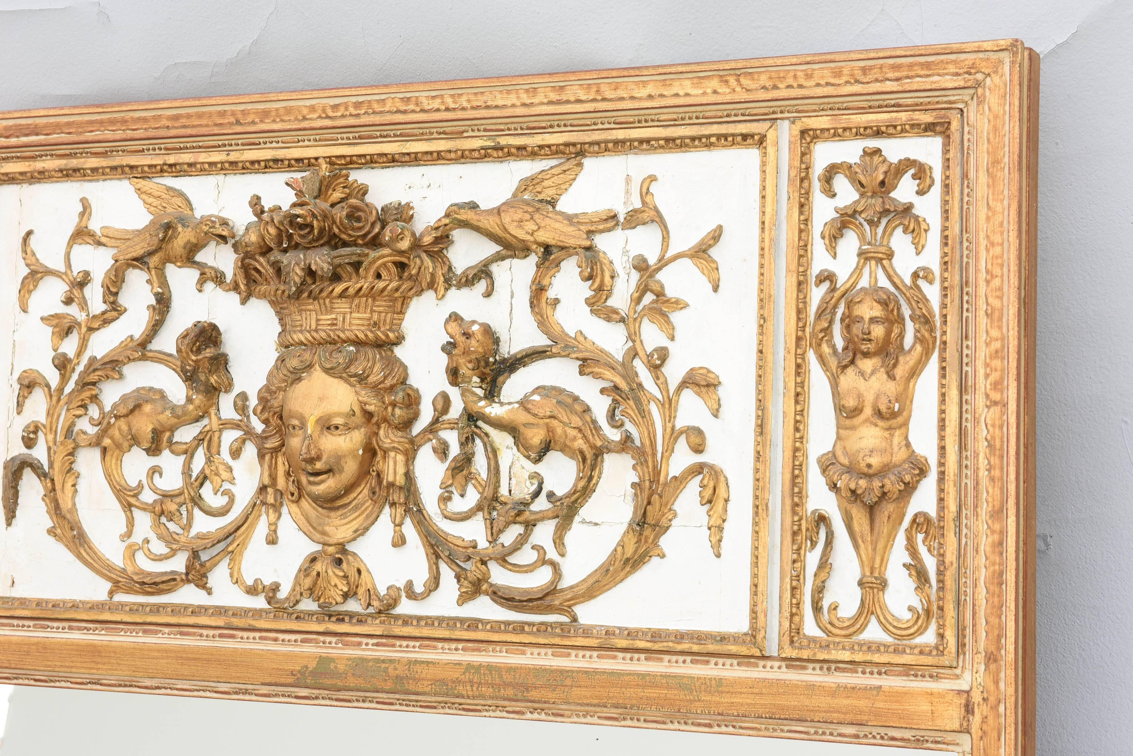 Carved Painted and Parcel Gilt Trumeau with 18th Century Pediment For Sale