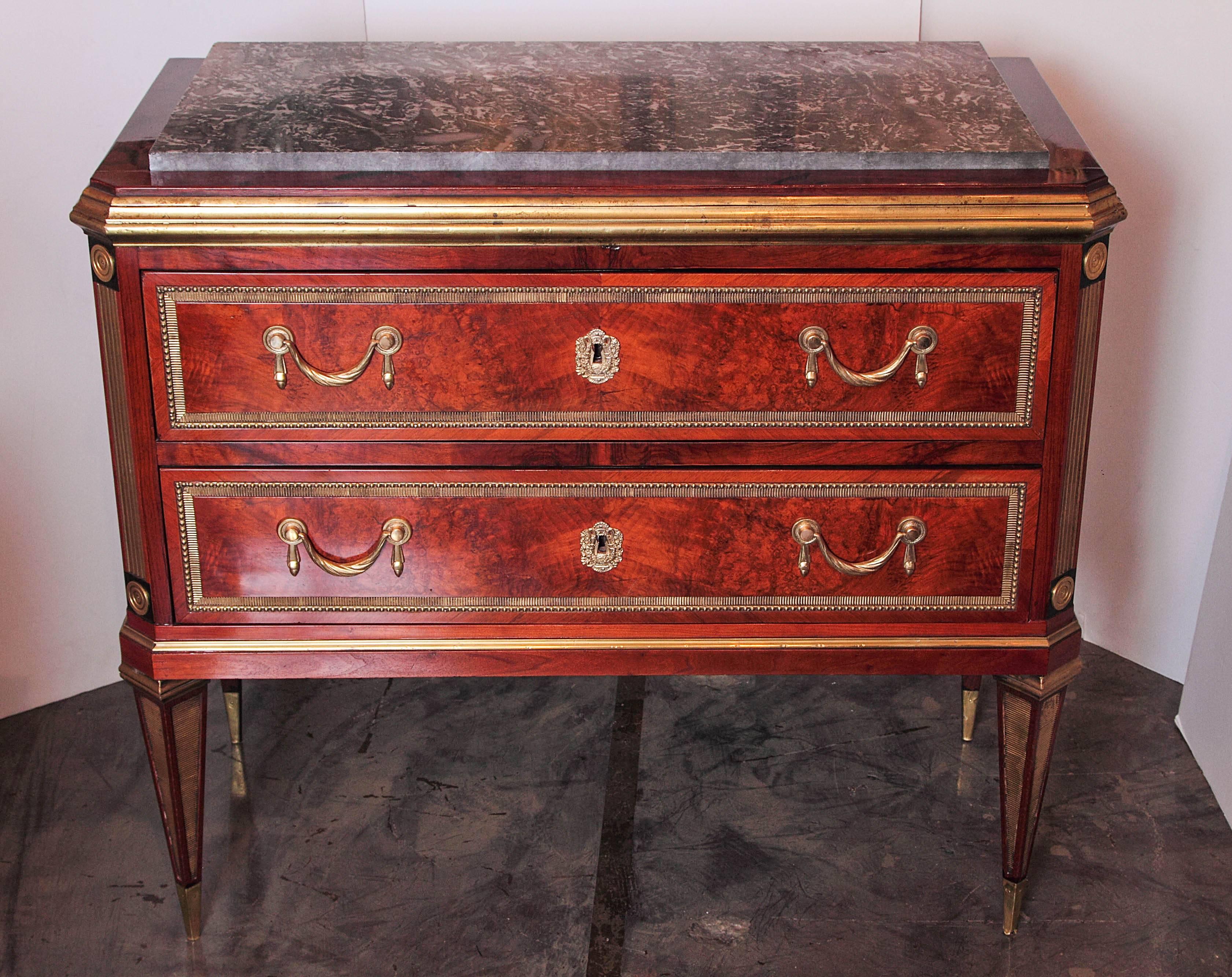 Late 19th c Russian mahogany with inlayed hand hammered brass mounts .
