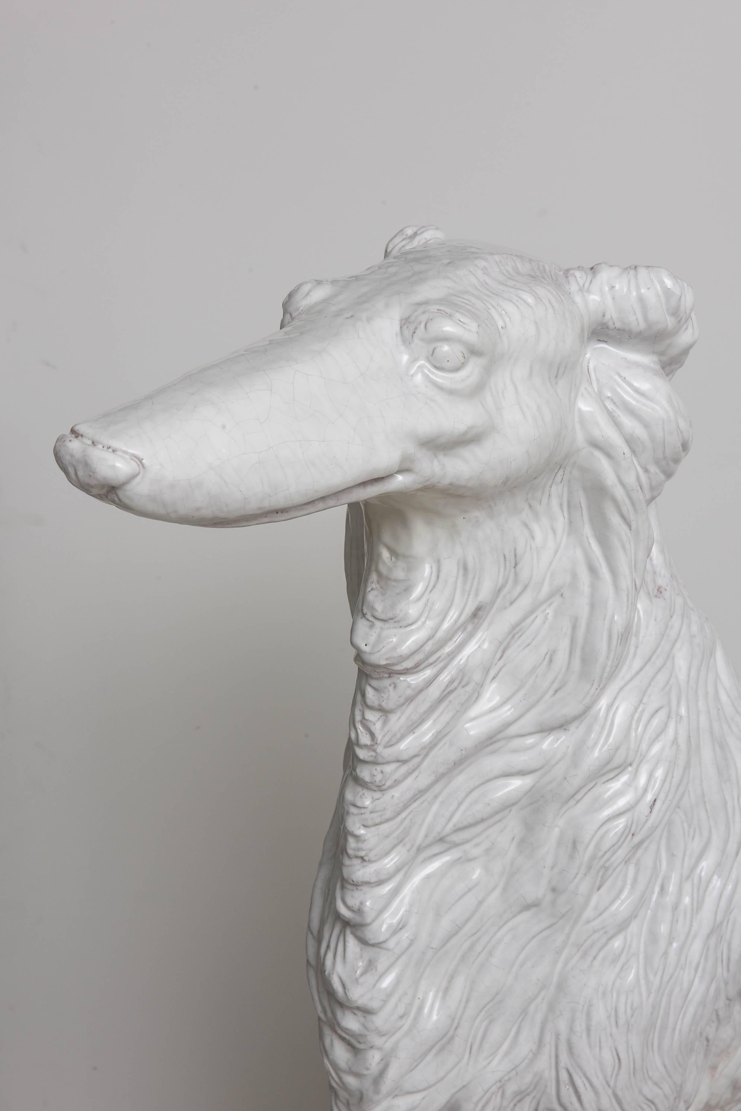 Life-sized Russian wolfhound in white glazed terracotta. Made in Italy.