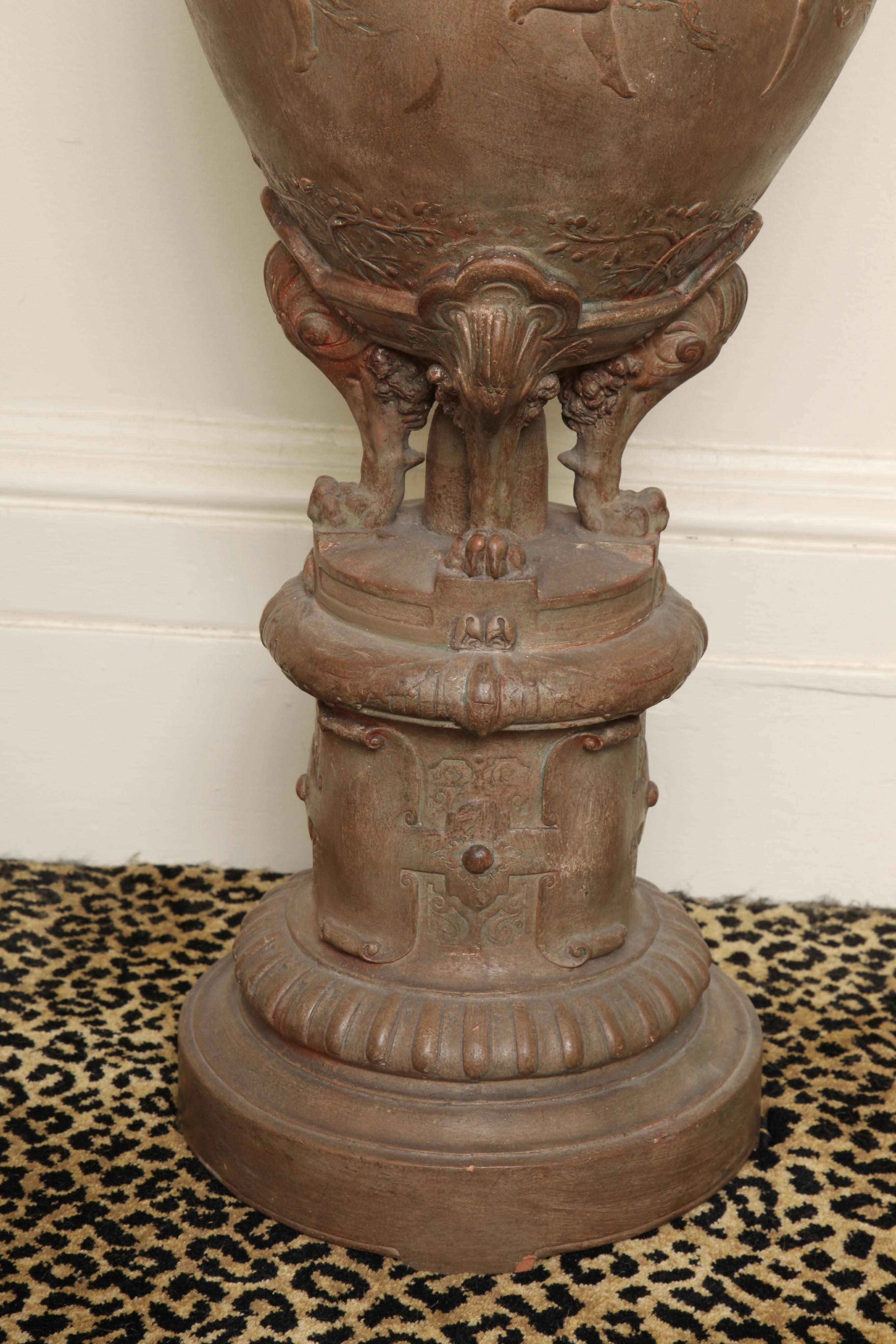 Finely executed urn by sculptor Joseph Chéret (French, 1838-1894) inset with period aluminum liner for flowers. Epitomizes the mid-19th century Second Empire style with French Renaissance Revival motifs including strapwork cartouches and dancing