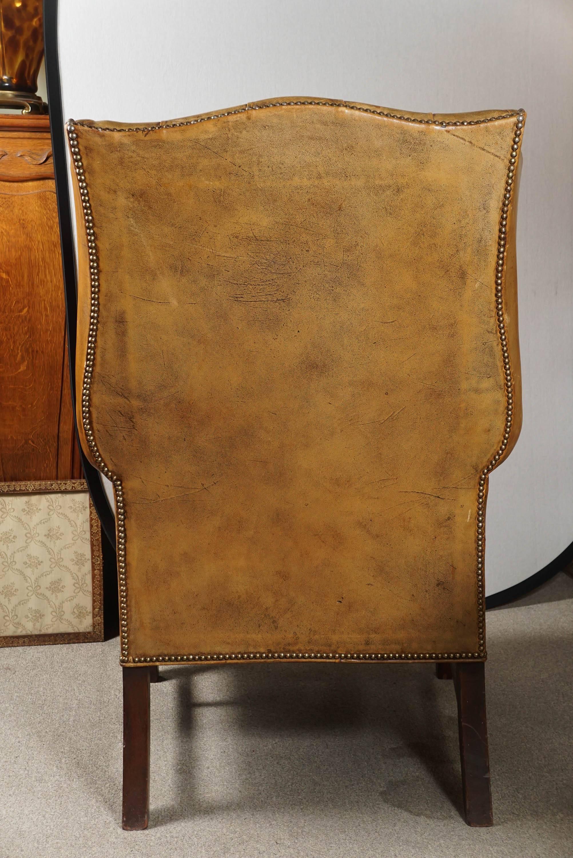 British Tufted leather wingback chair