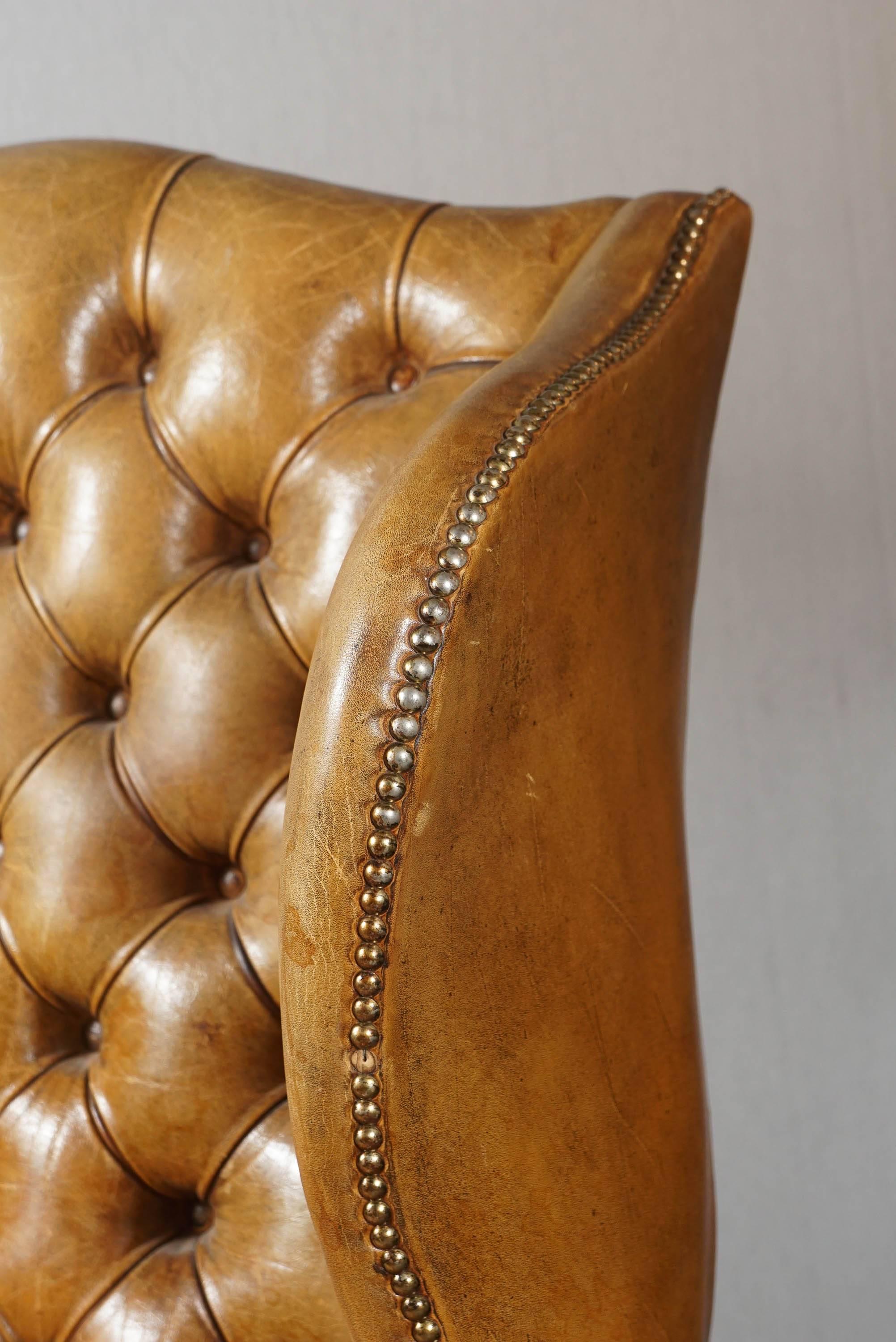 Tufted leather wingback chair In Good Condition In Hudson, NY