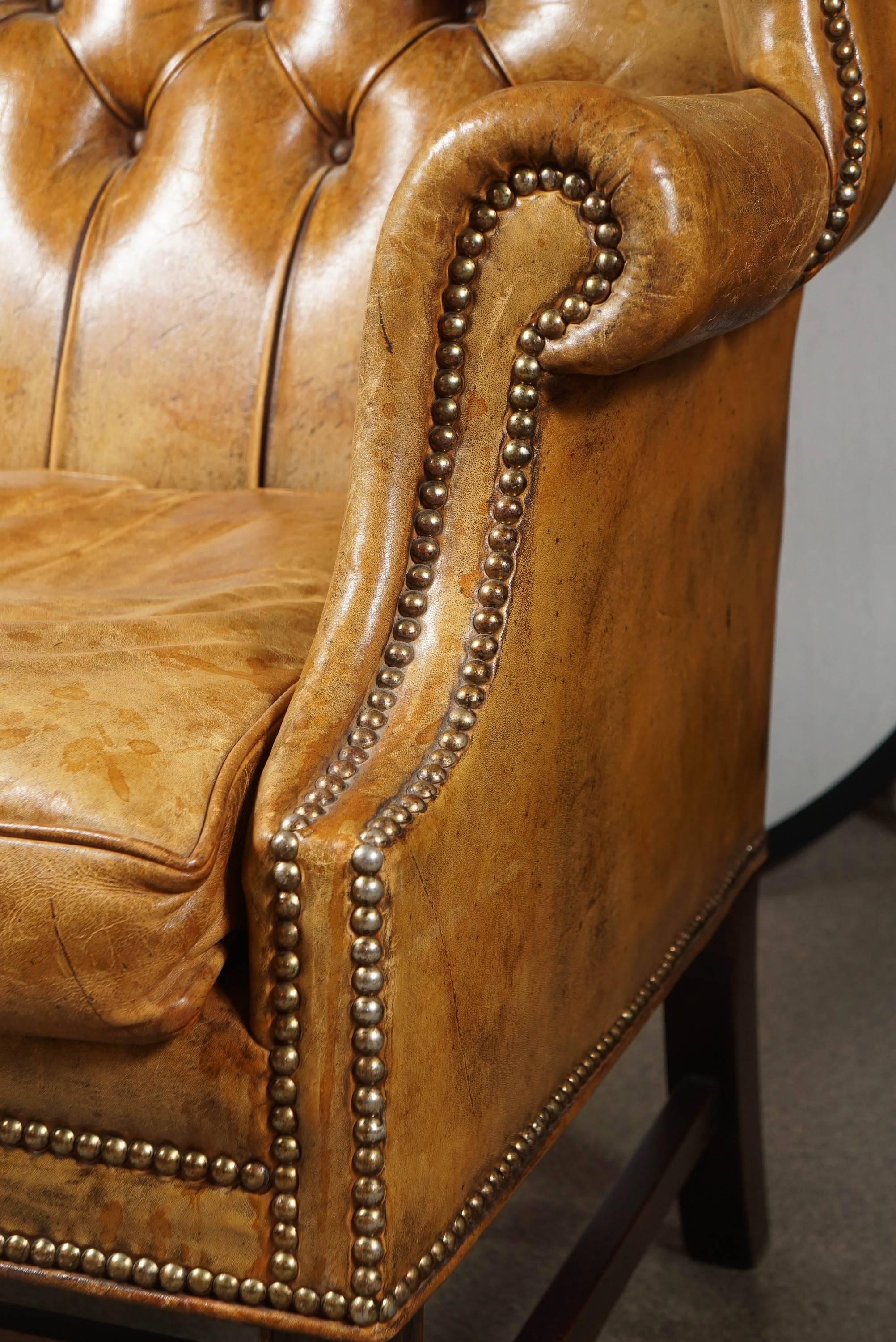 Late 19th Century Tufted leather wingback chair