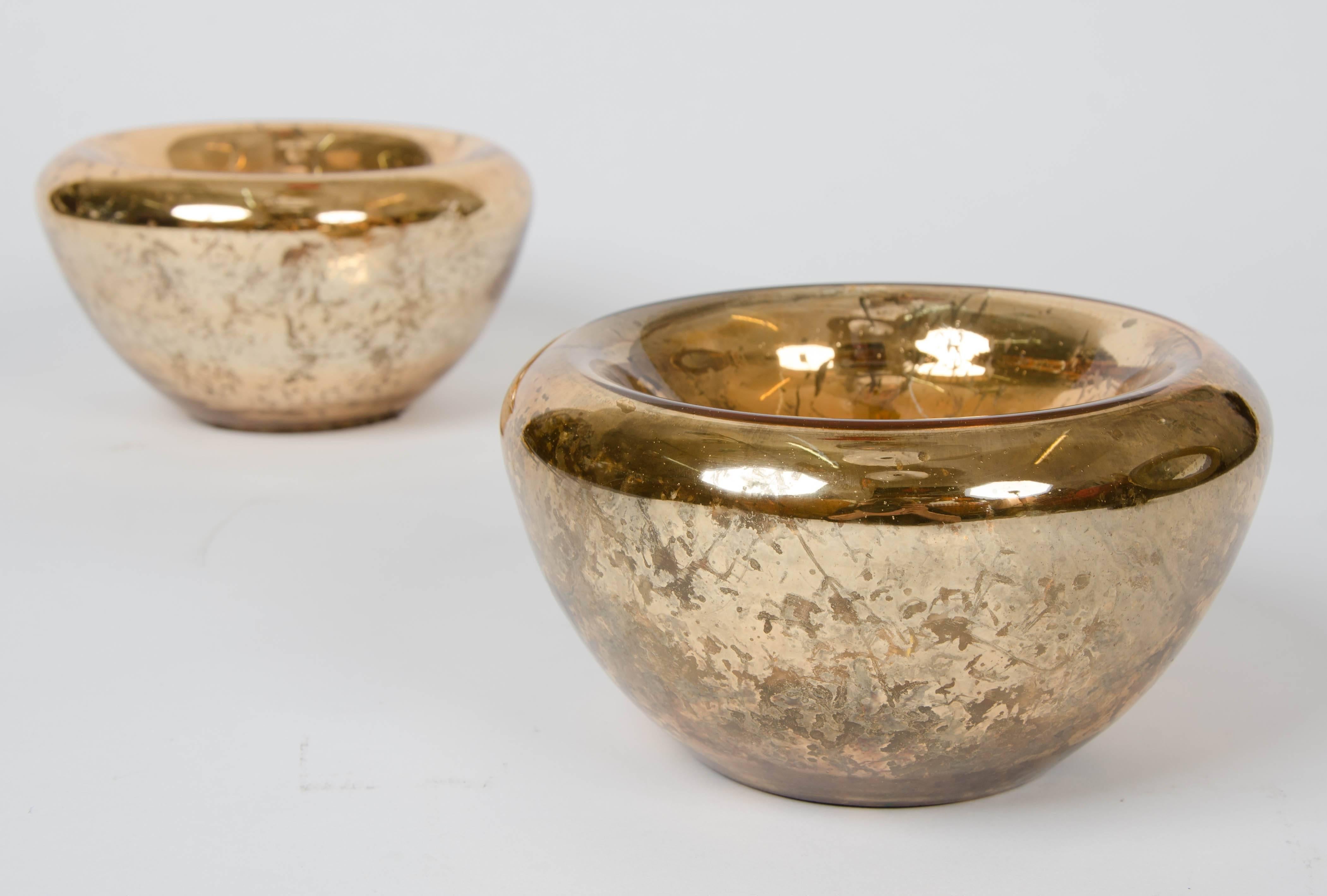1960s pair of Murano glass bowls gilded with a gold foil.