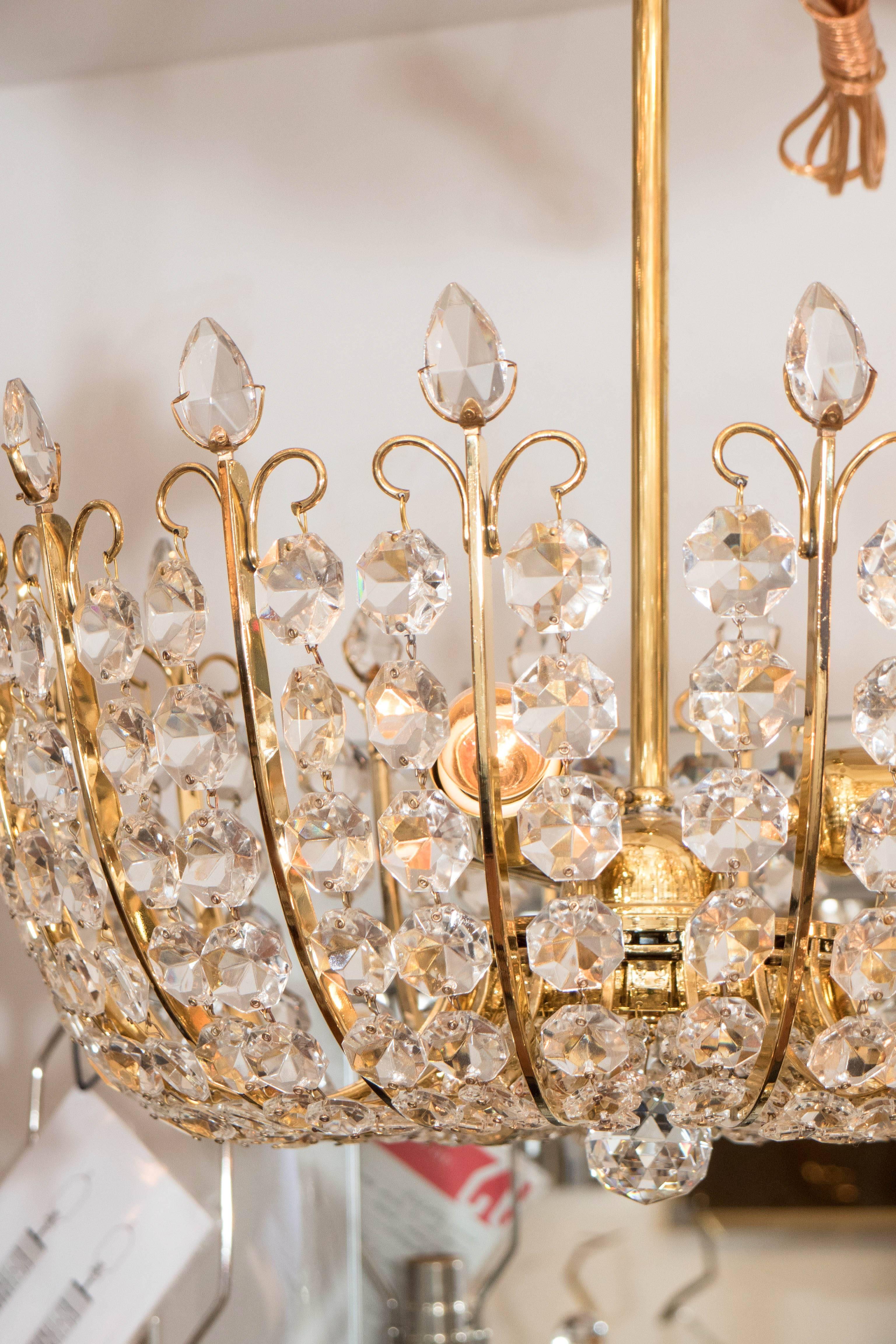 Brass and Crystal Element Chandelier In Good Condition In New York, NY