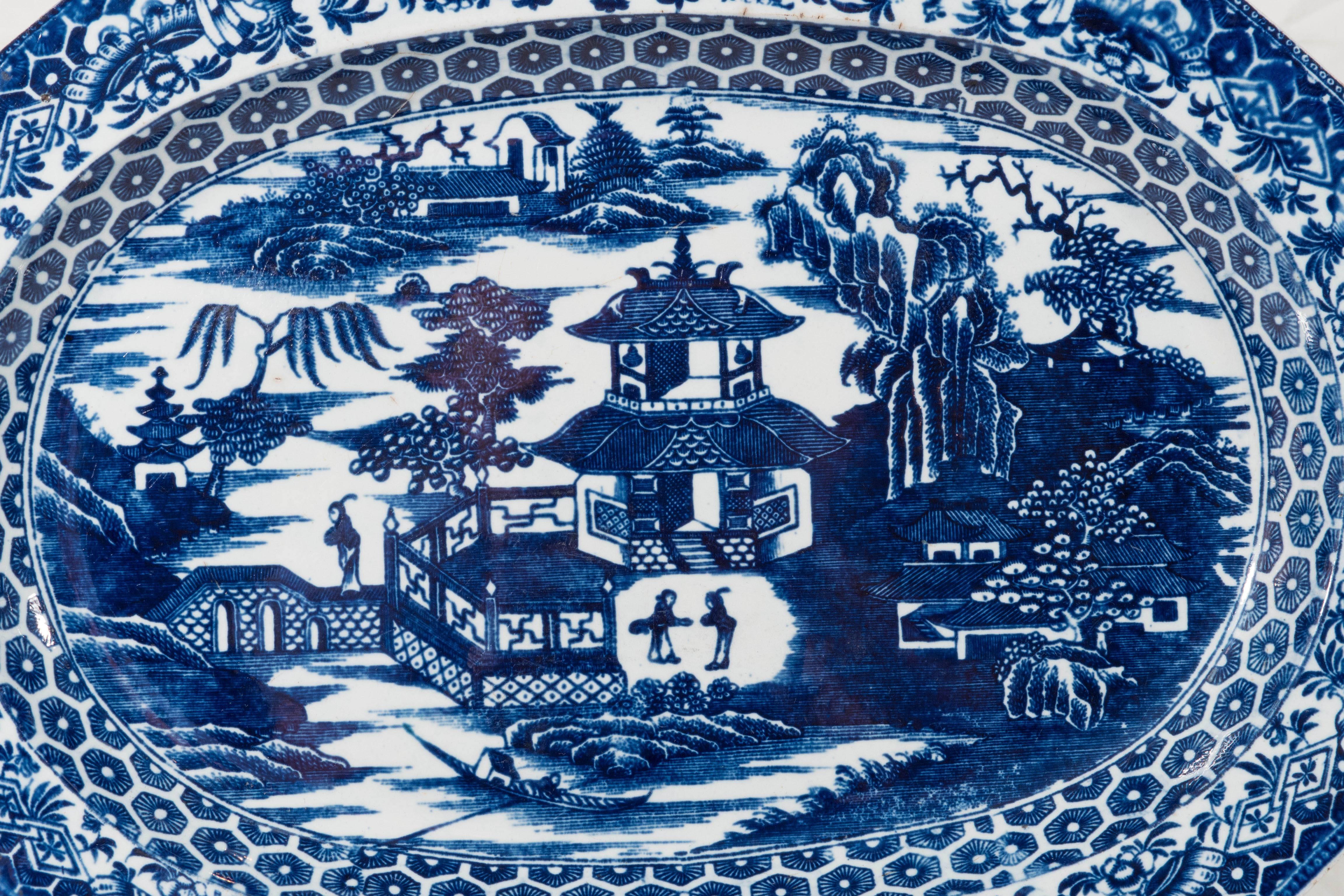 A lovely blue and white platter made by J Heath at the end of the 18th century. The pattern is a variation on the well known 